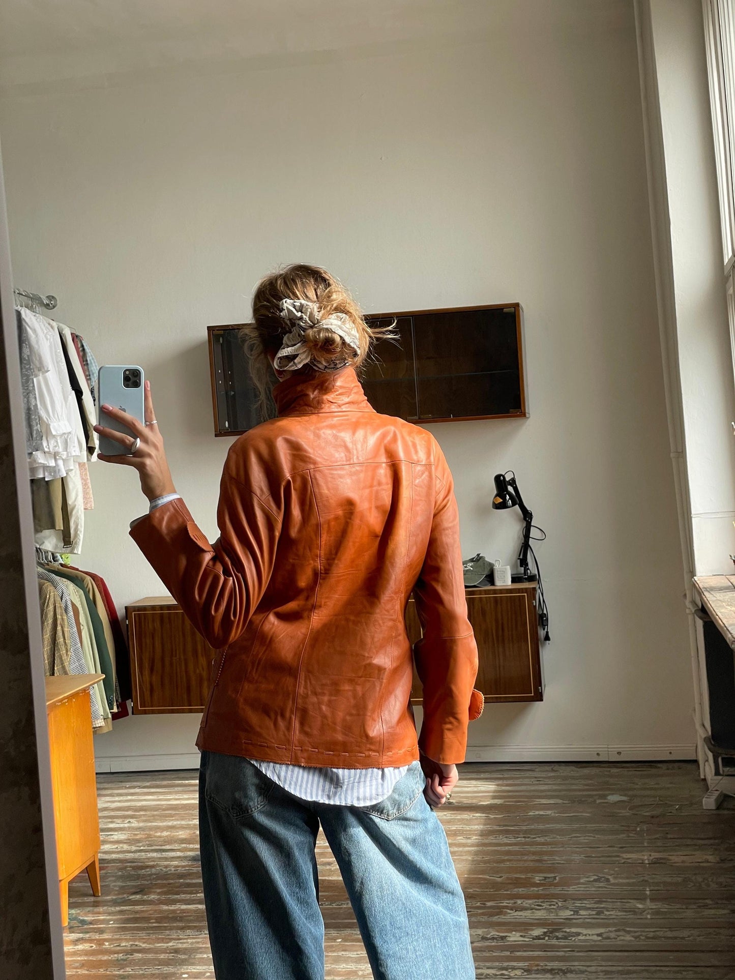 Vintage 90s burnt orange leather jacket with a high collar