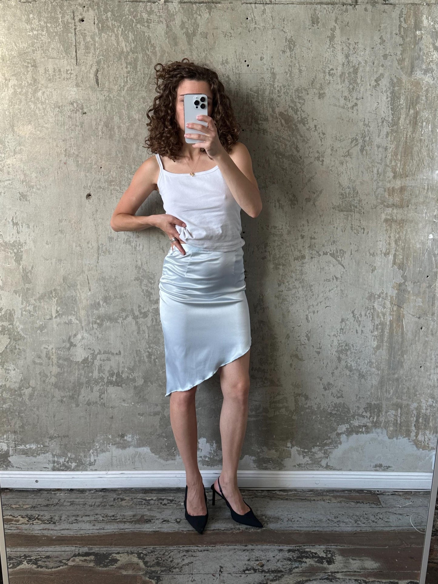 Vintage mini skirt with asymmetrical edge in light blue