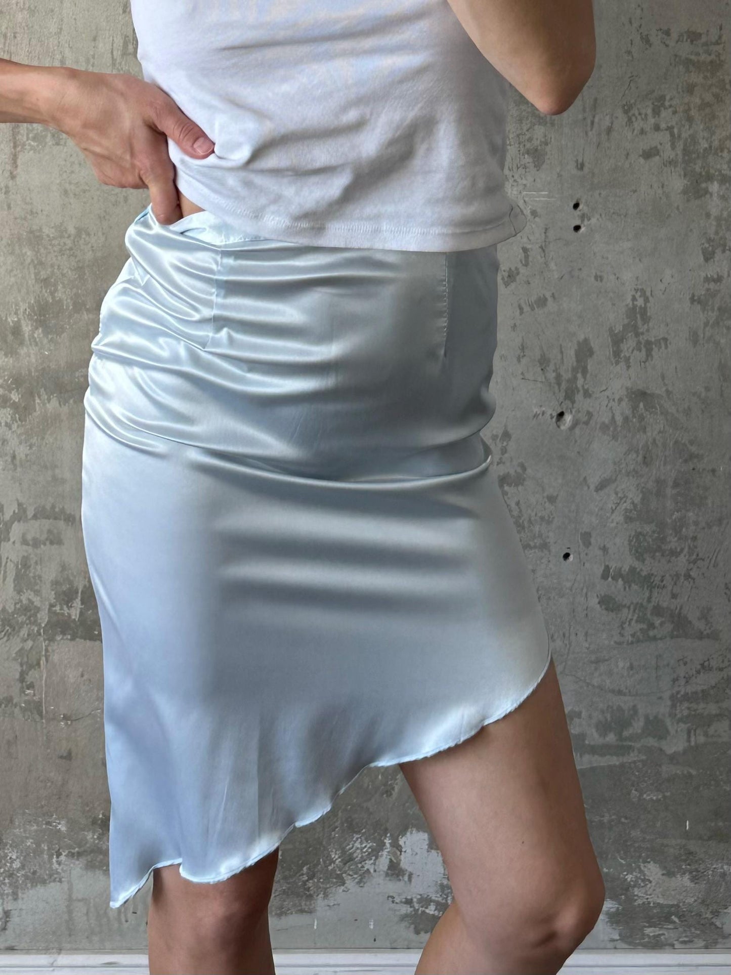 Vintage mini skirt with asymmetrical edge in light blue