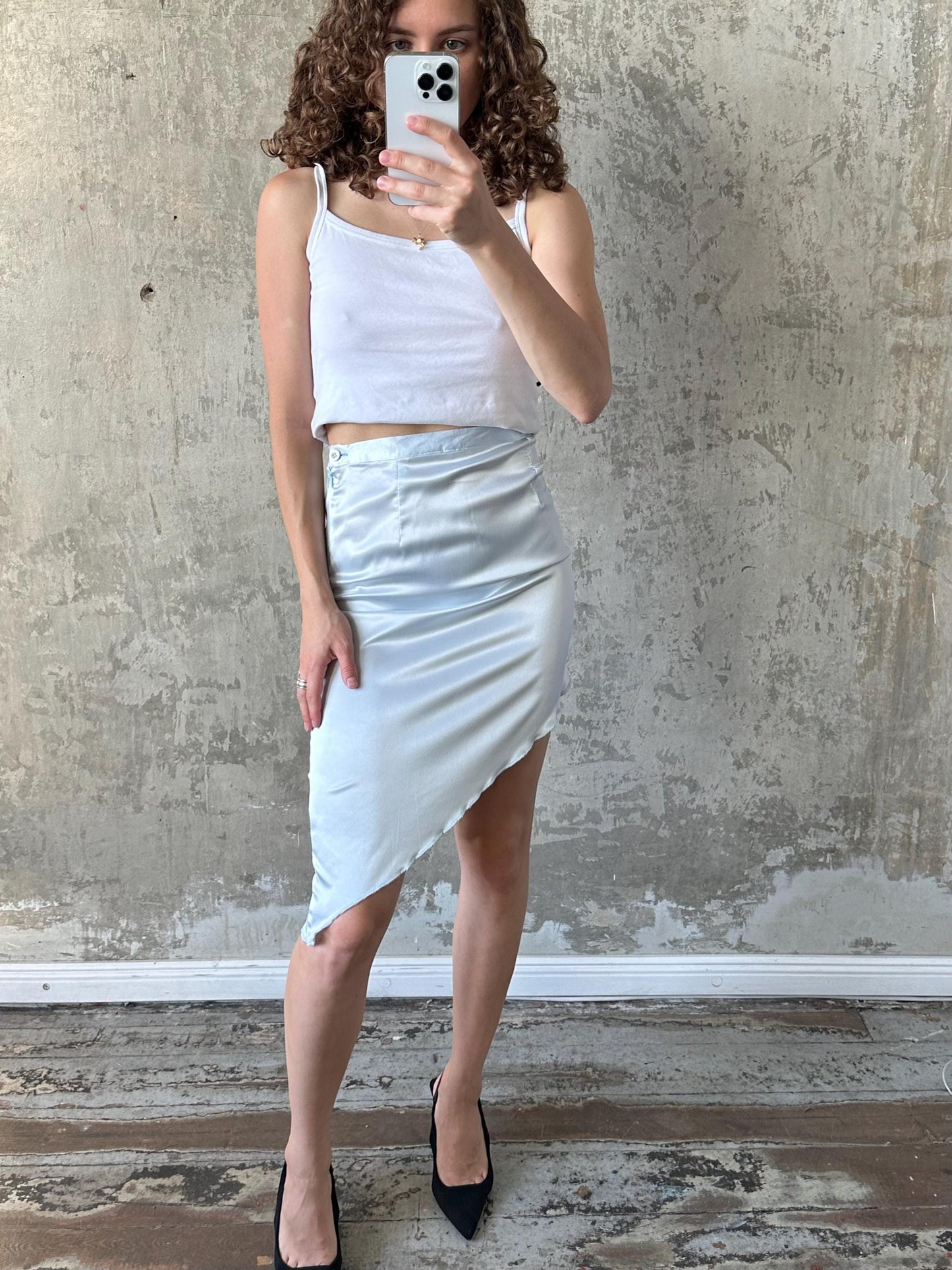 Vintage mini skirt with asymmetrical edge in light blue
