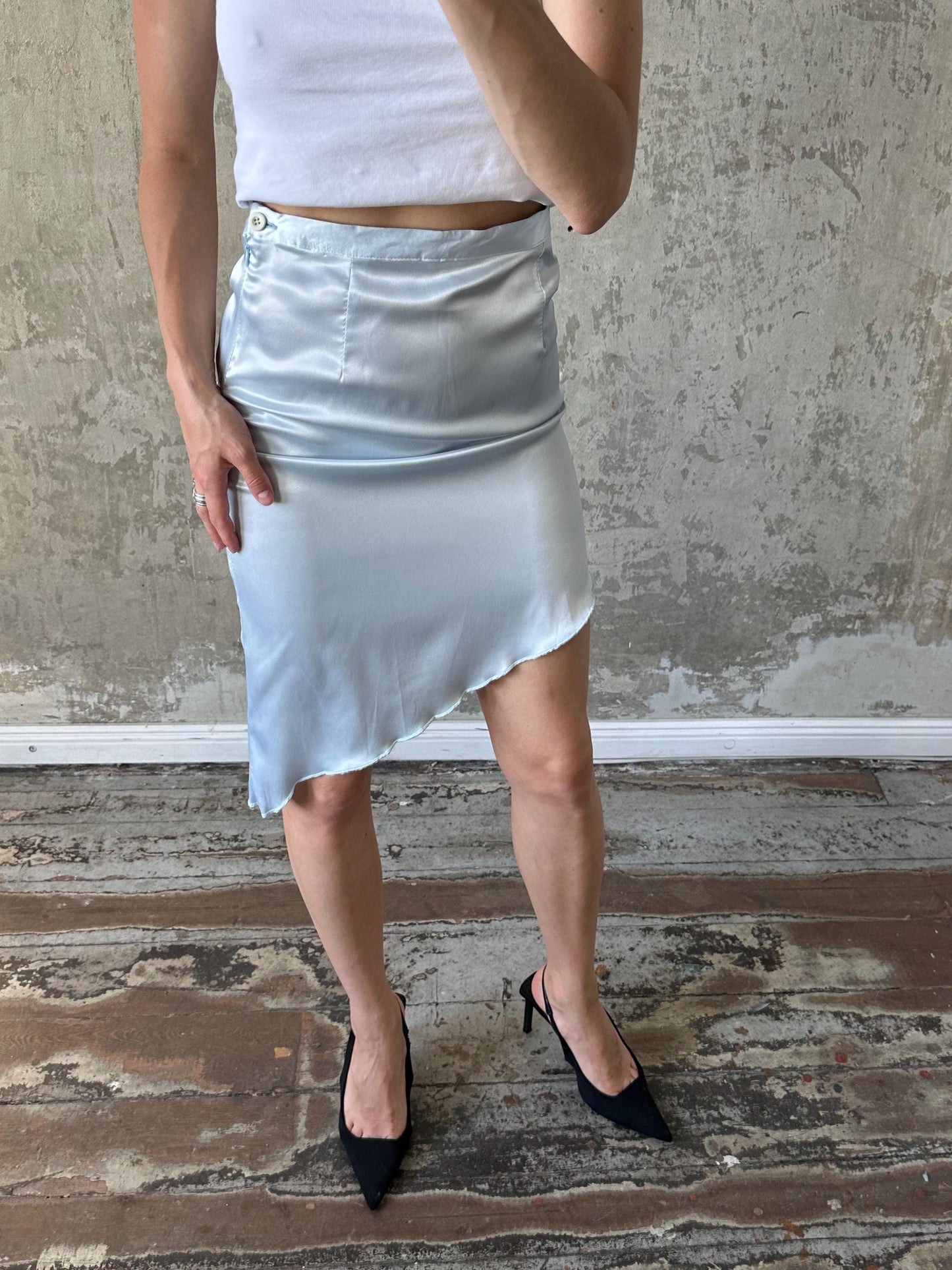 Vintage mini skirt with asymmetrical edge in light blue
