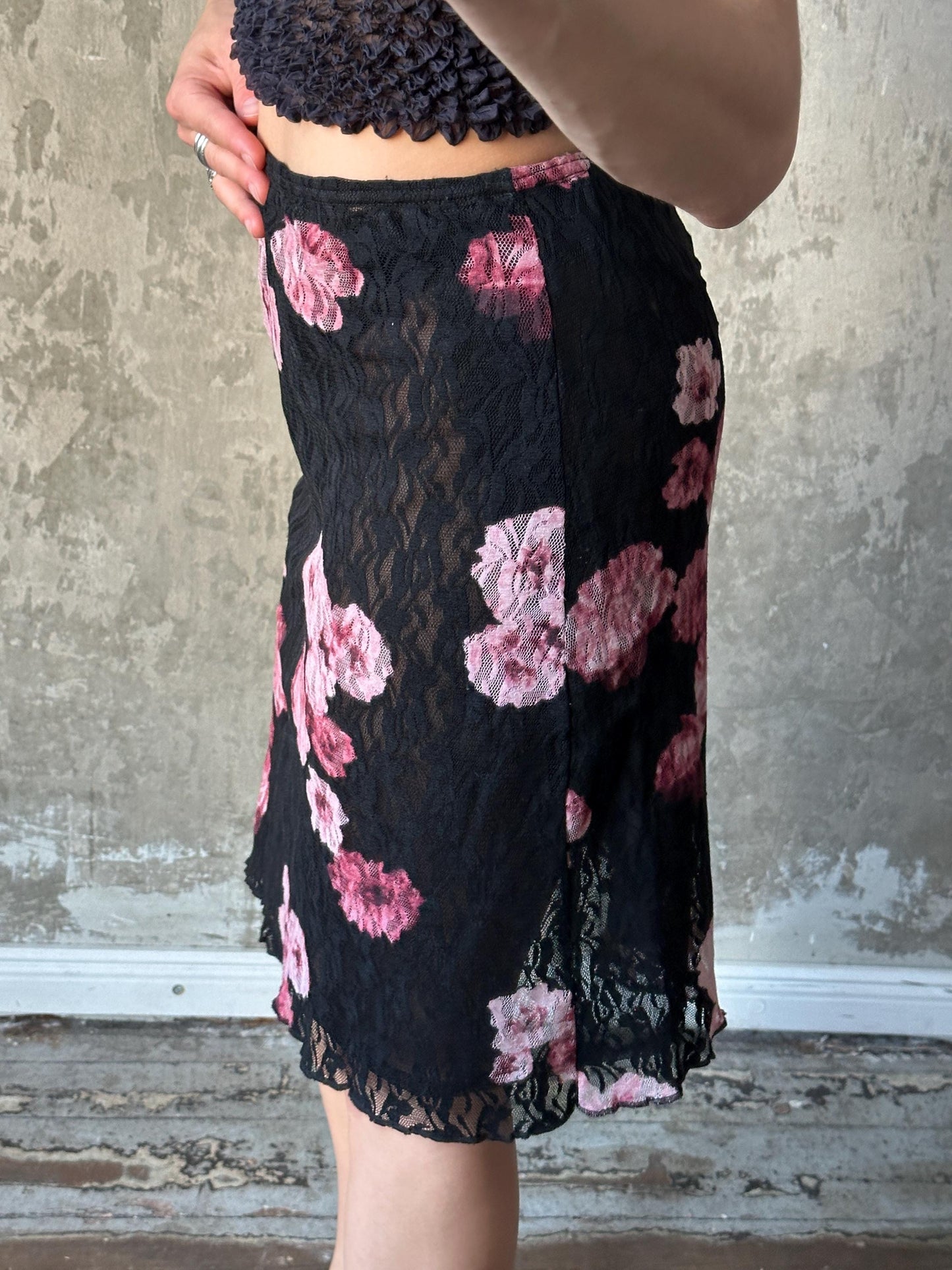 Vintage mini lace skirt with floral motif in black