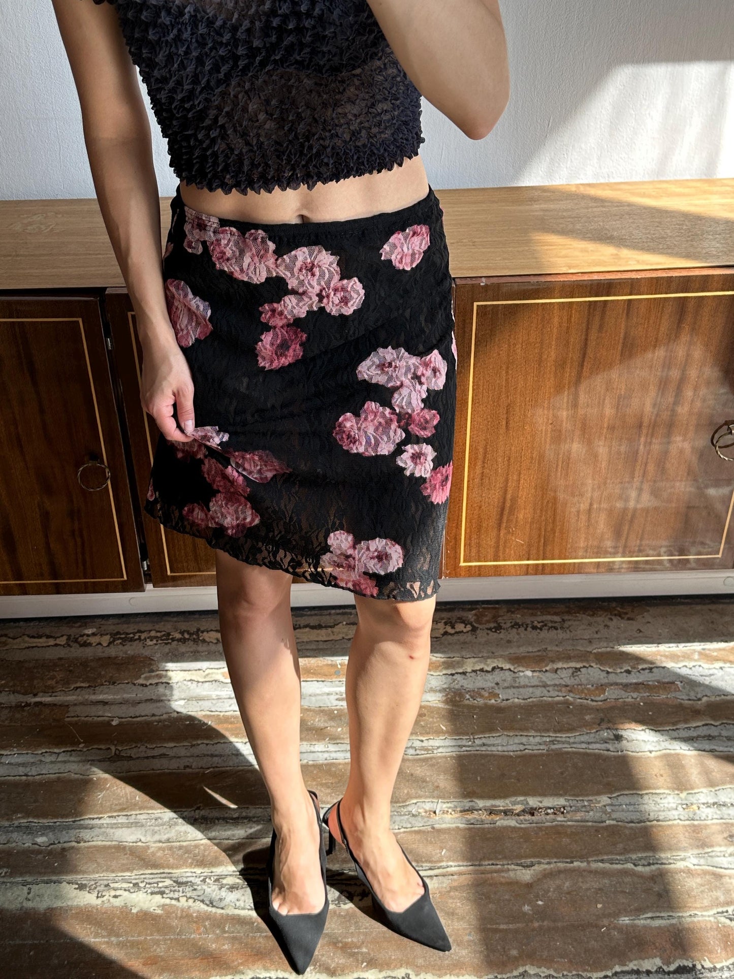 Vintage mini lace skirt with floral motif in black