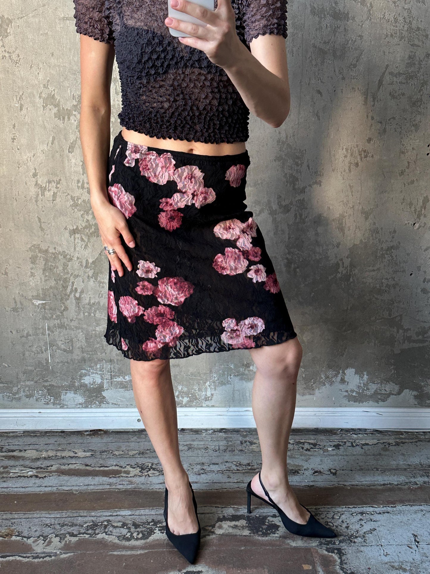 Vintage mini lace skirt with floral motif in black