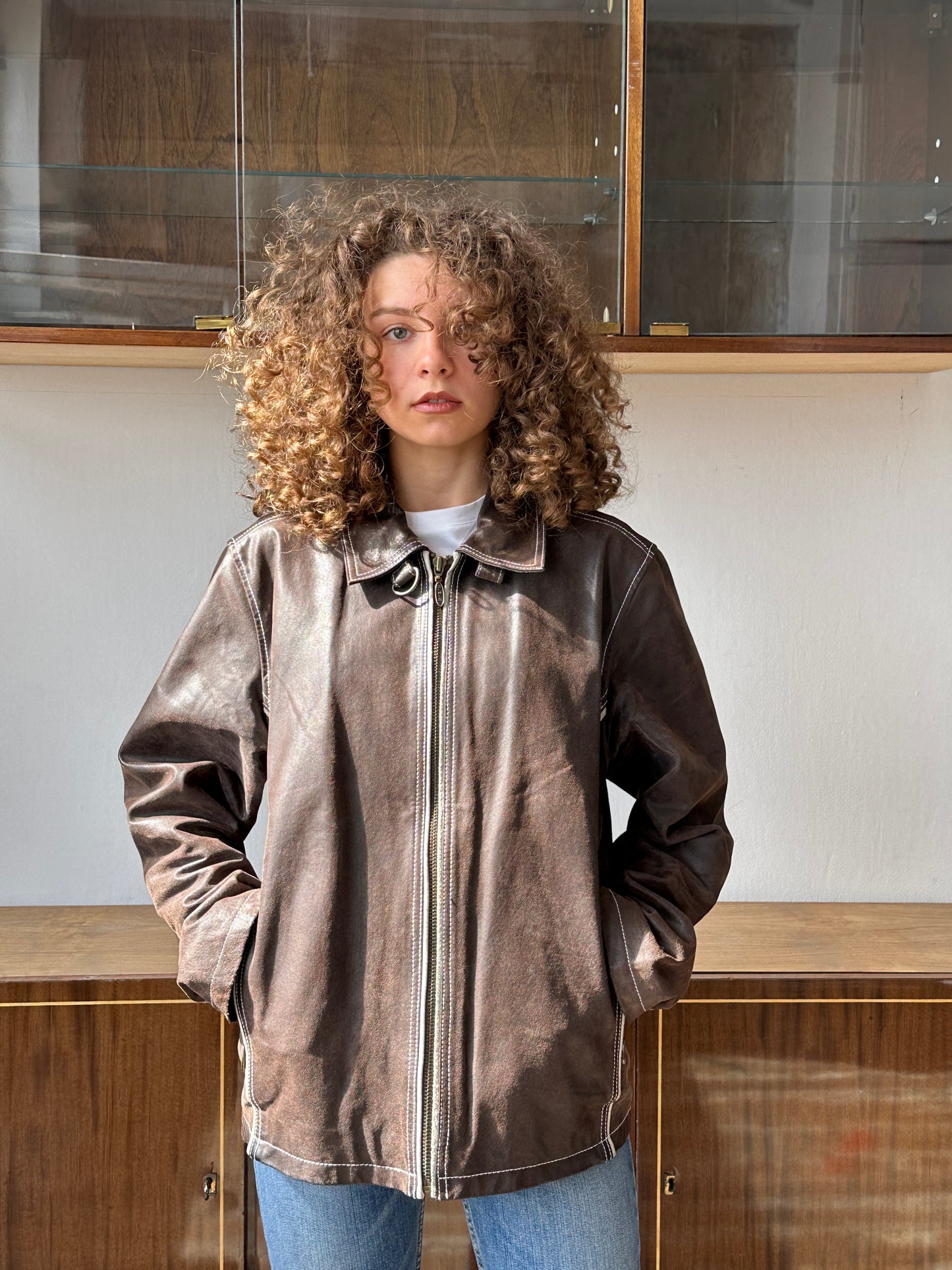Vintage brown leather jacket with white seam