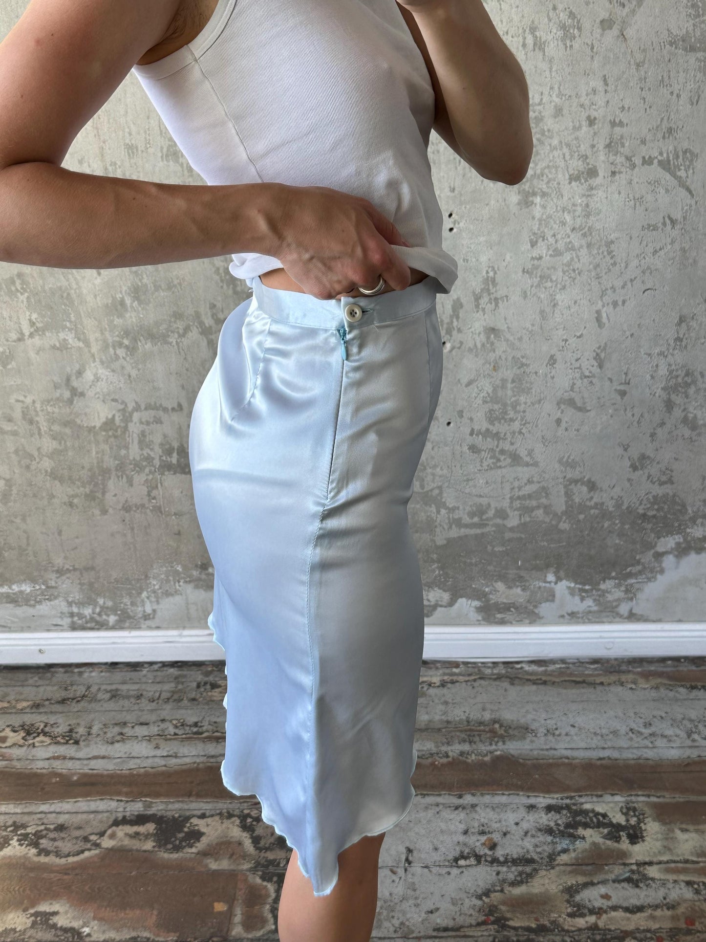 Vintage mini skirt with asymmetrical edge in light blue