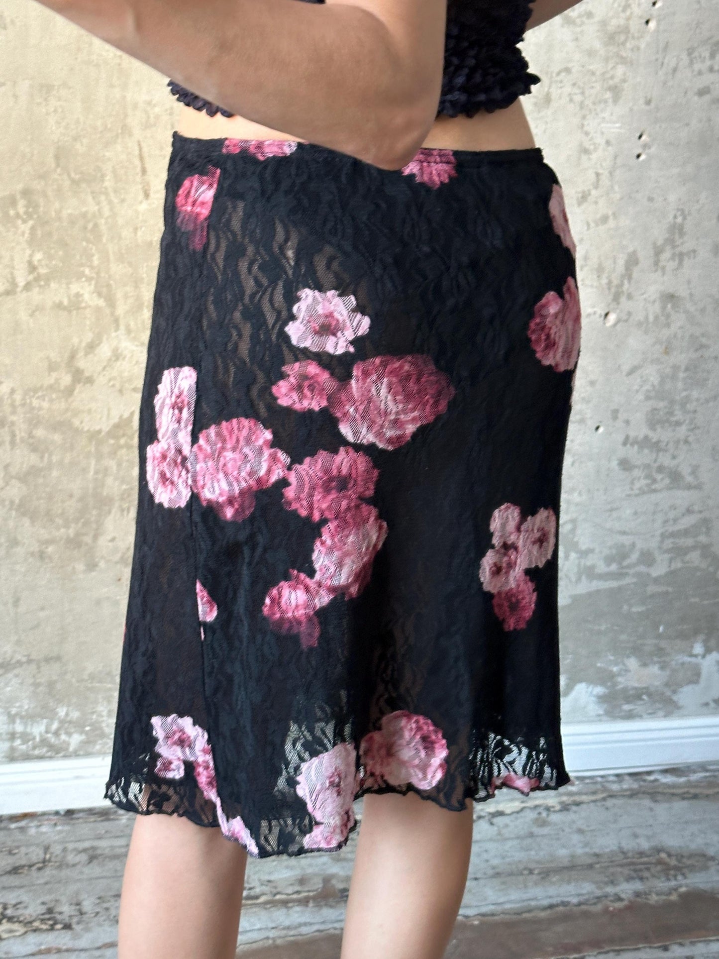 Vintage mini lace skirt with floral motif in black