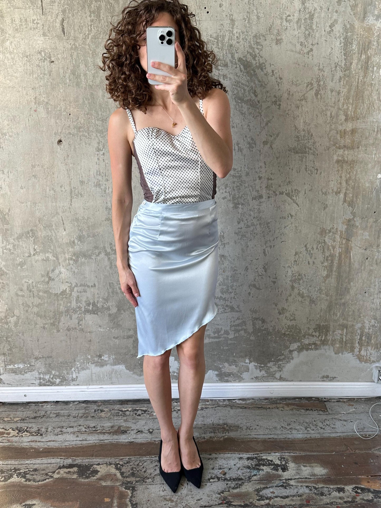 Vintage mini skirt with asymmetrical edge in light blue