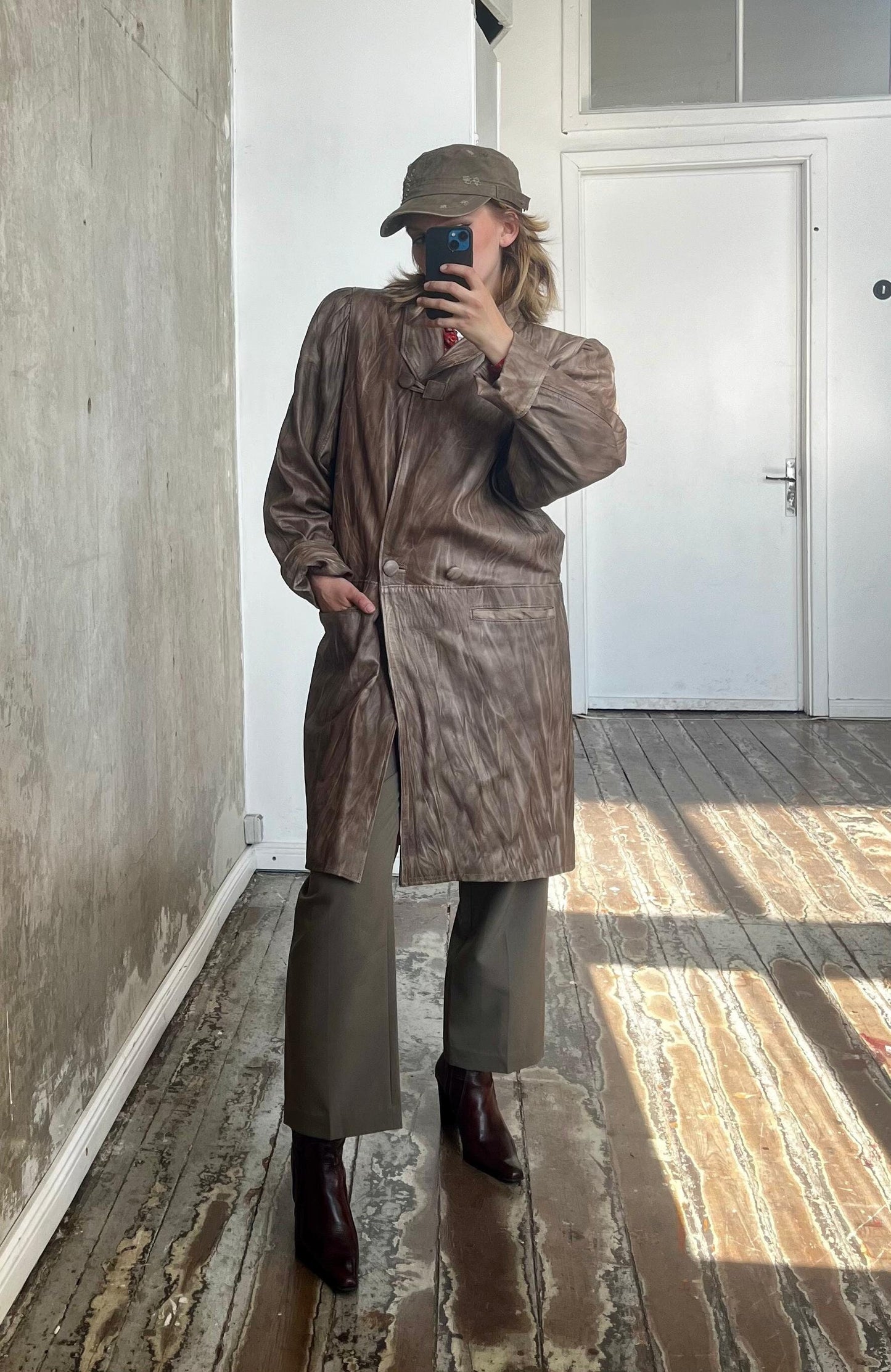 Vintage leather padded shoulder coat in washed out brown