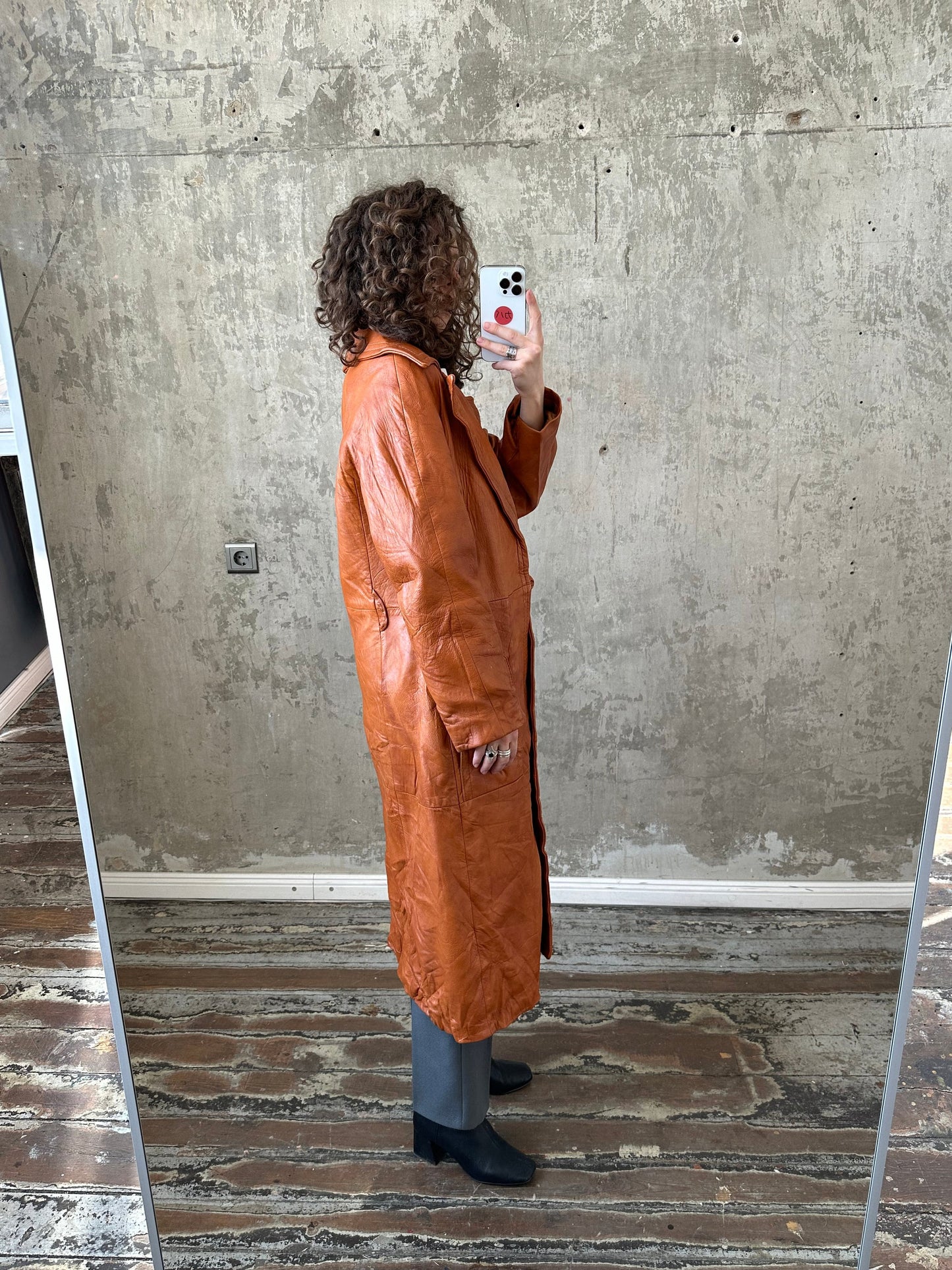 Vintage 90s genuine leather coat in orange