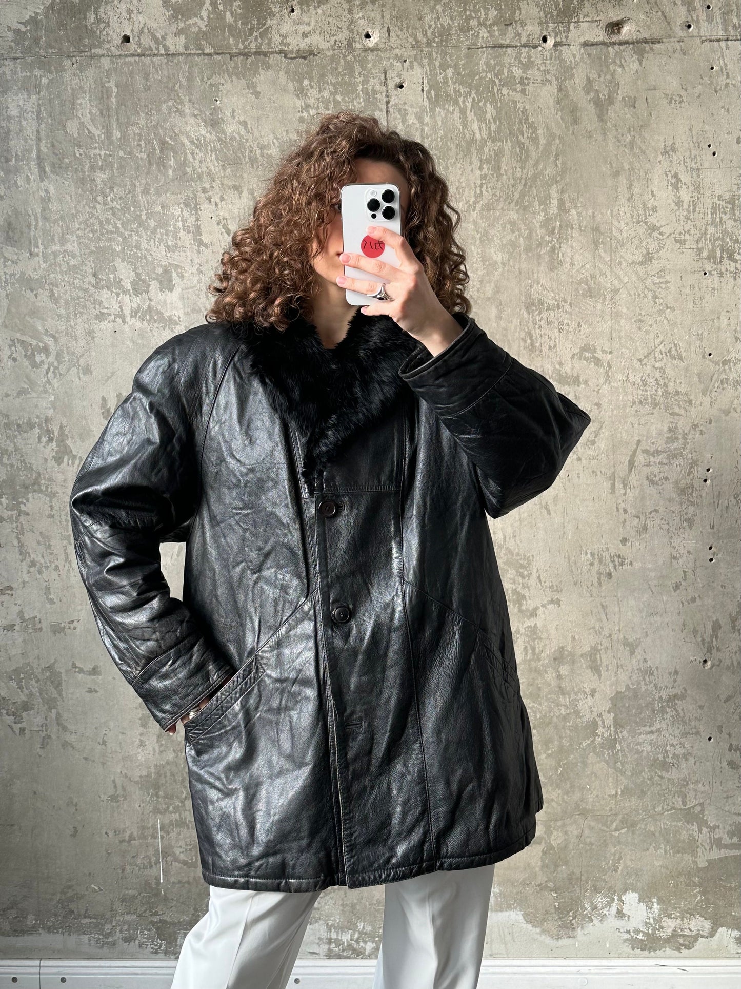 Vintage 90s black leather jacket with fur collar