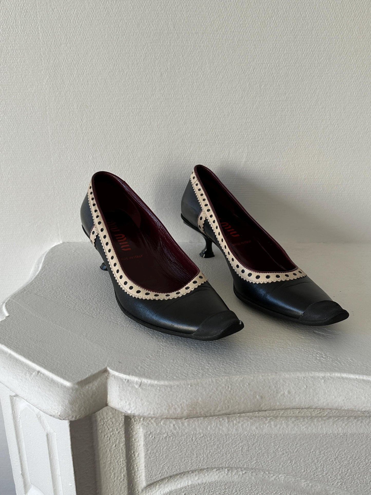 Miu Miu Black & Cream Perforated Leather Kitten Heel Pumps I US 6.5