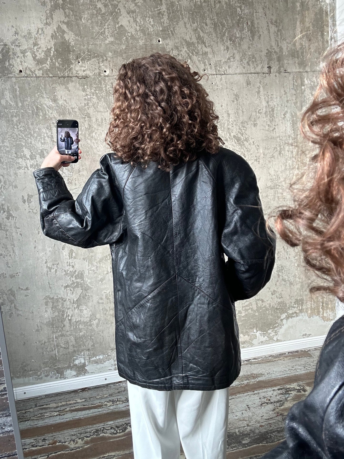 Vintage 90s black leather jacket with fur collar