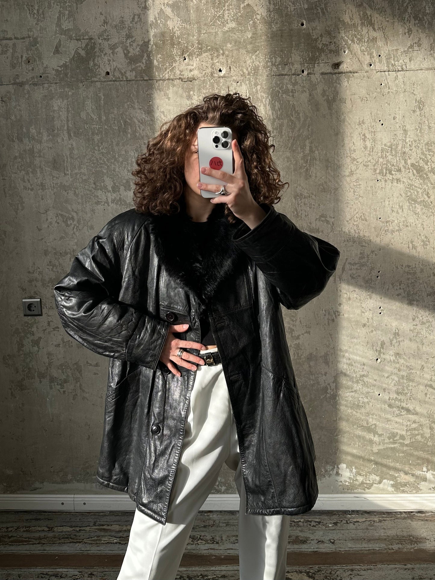Vintage 90s black leather jacket with fur collar