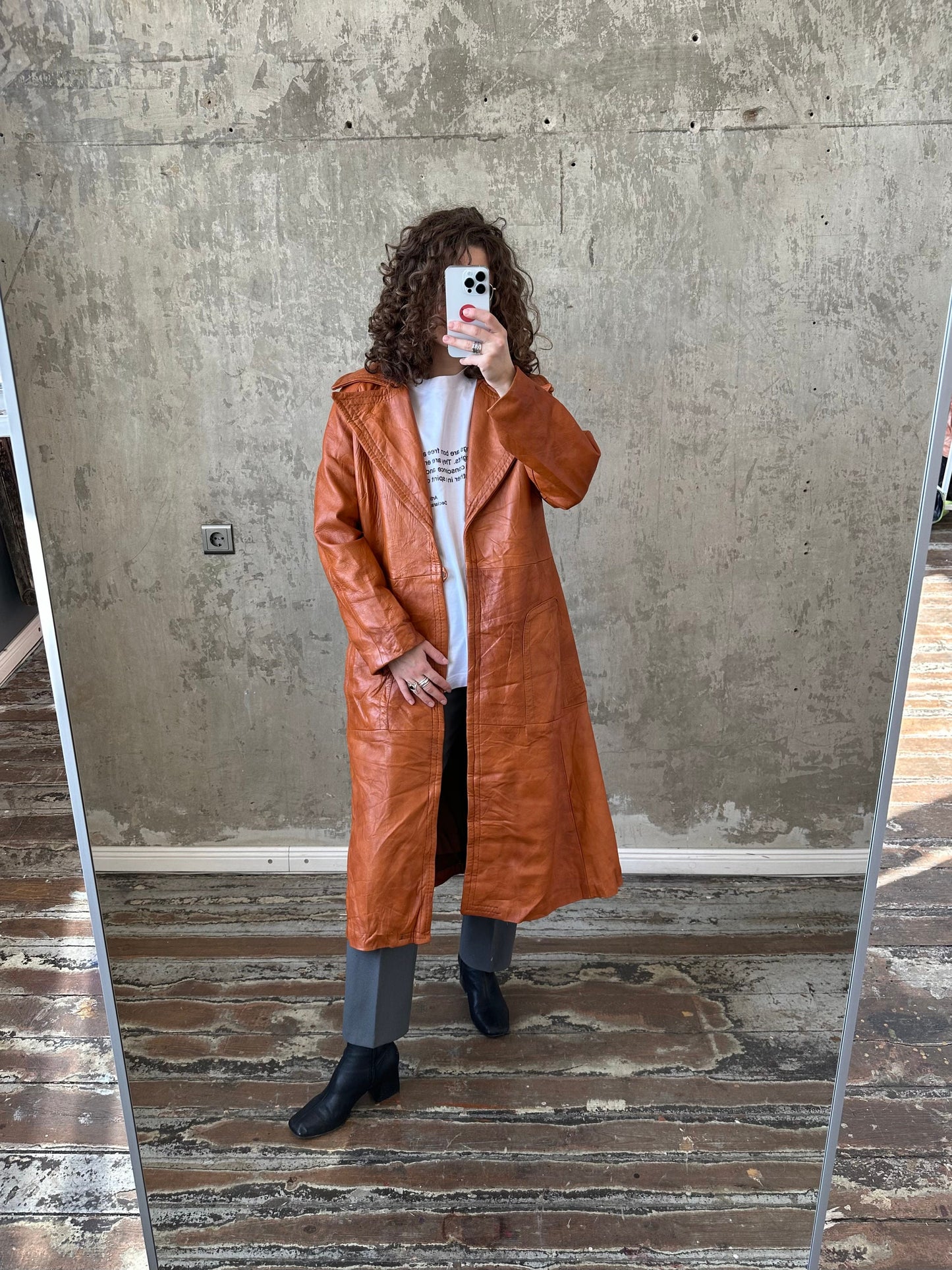 Vintage 90s genuine leather coat in orange