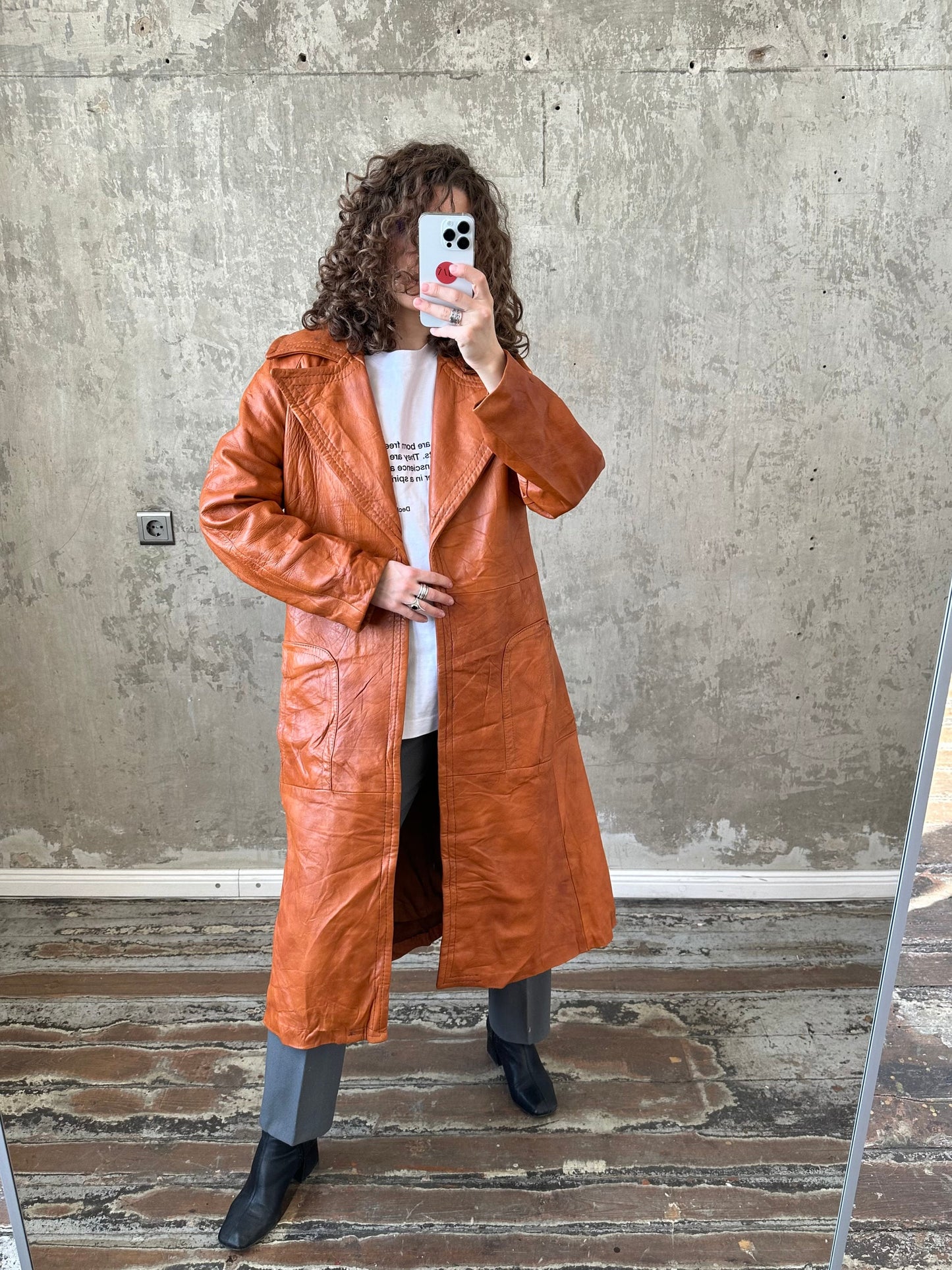 Vintage 90s genuine leather coat in orange