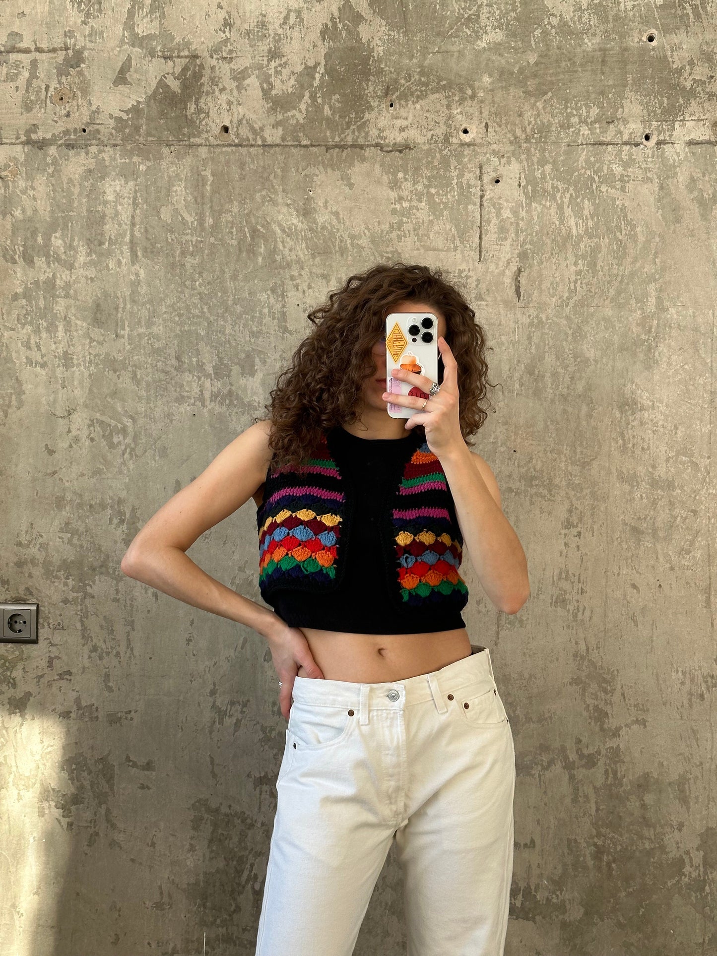 Vintage colorful knitted vest in bright blue, yellow, red