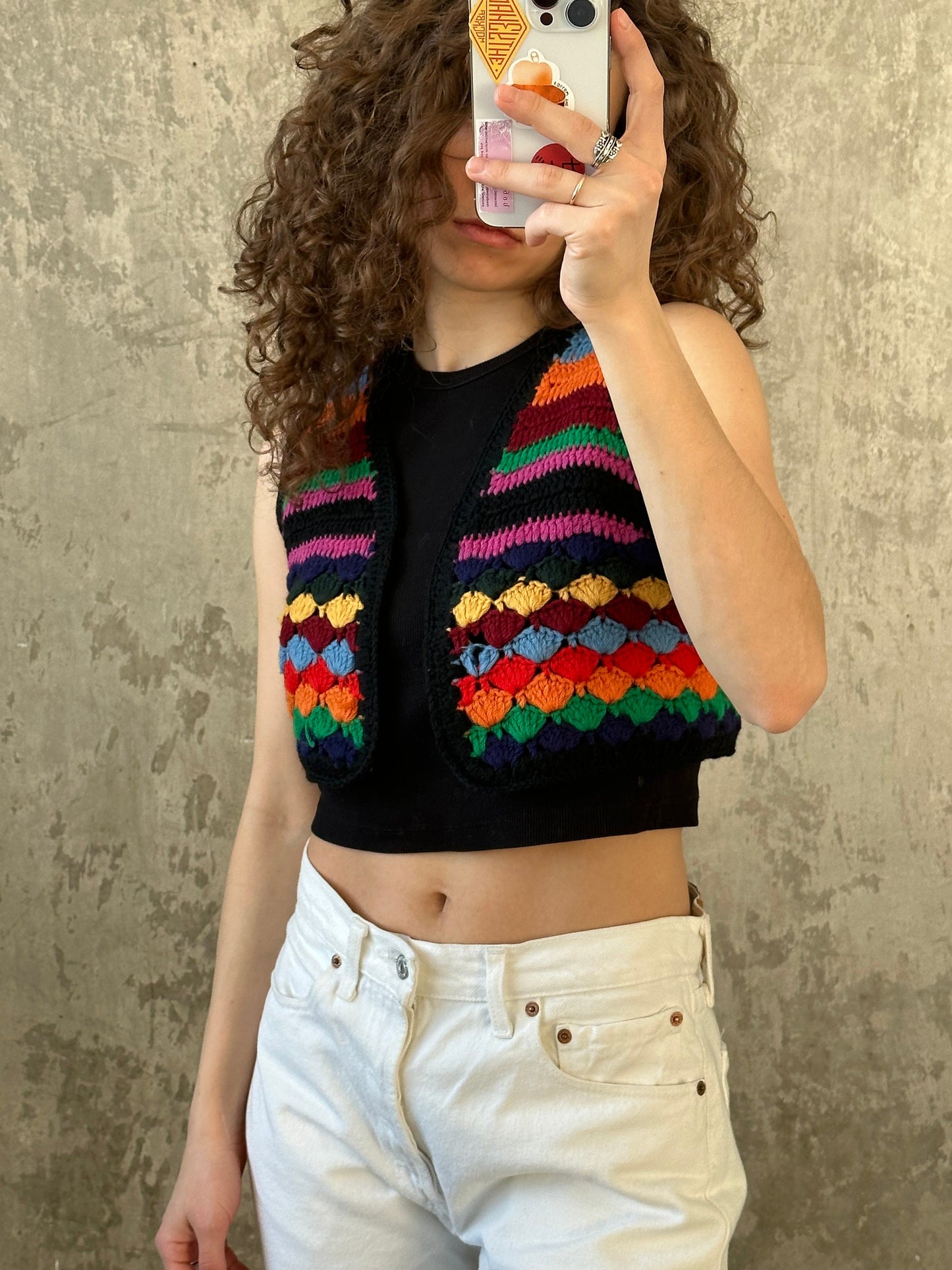 Vintage colorful knitted vest in bright blue, yellow, red
