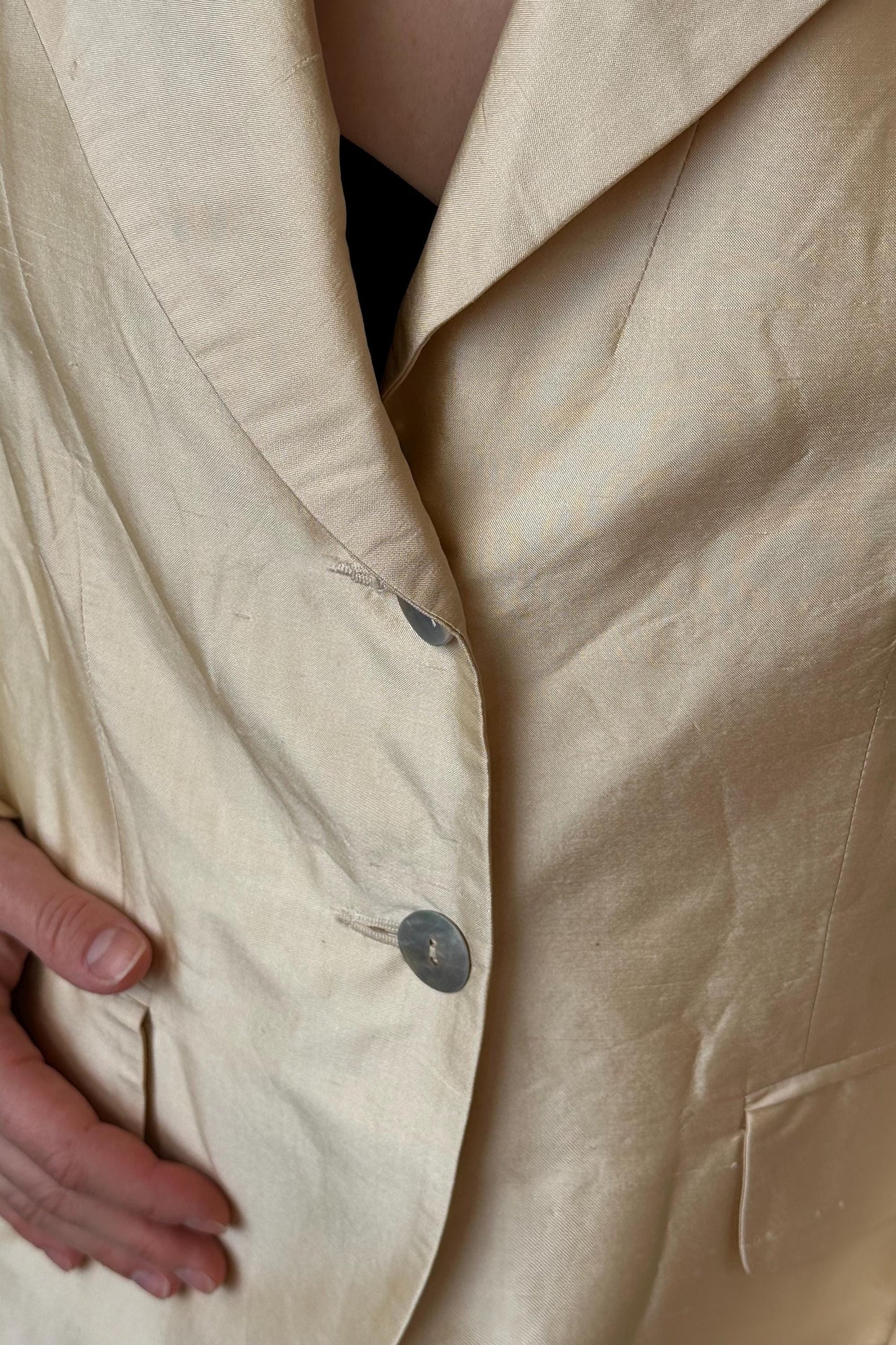 a close up of a person wearing a jacket