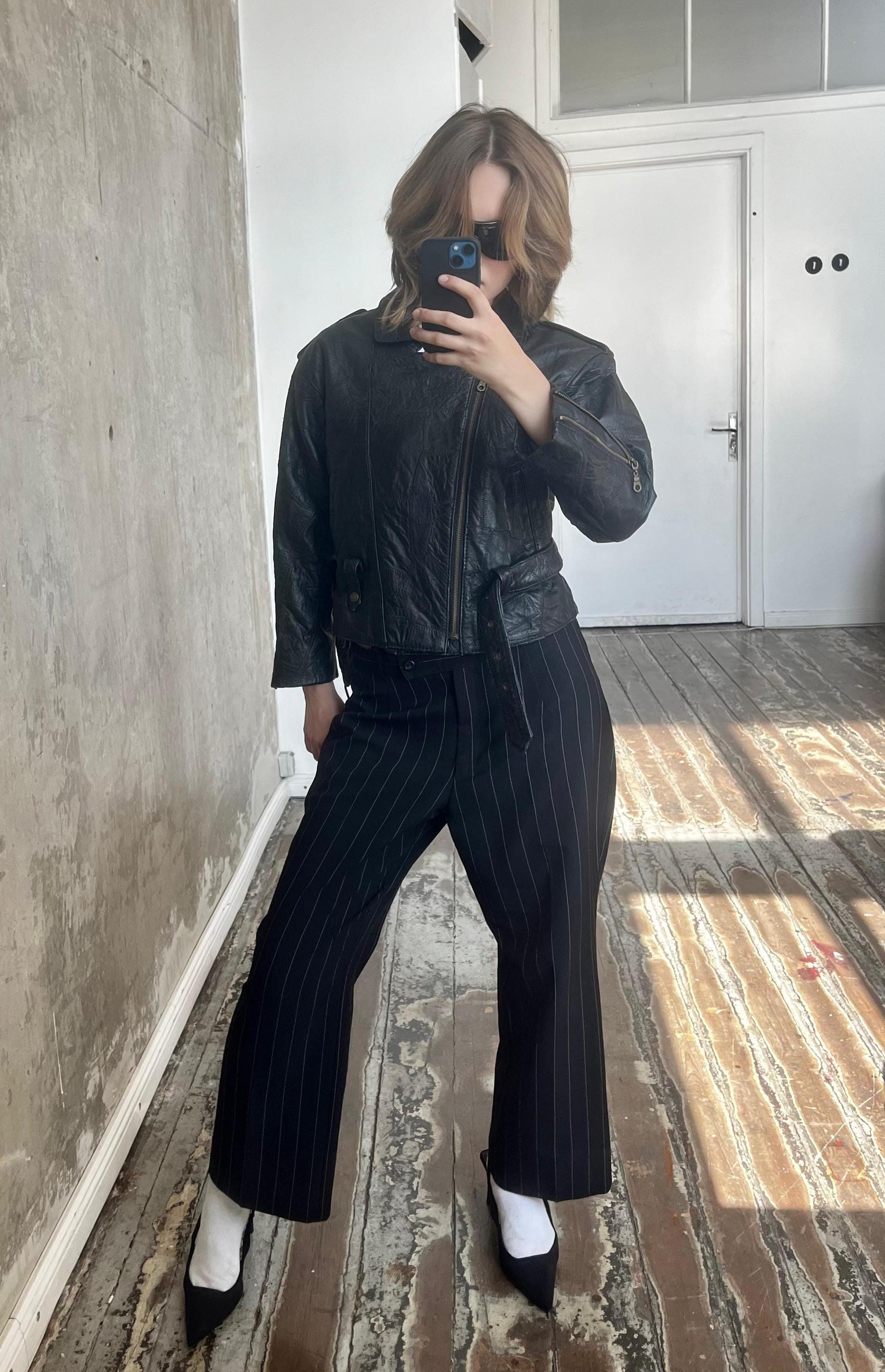 Vintage 80s belted biker leather jacket in black