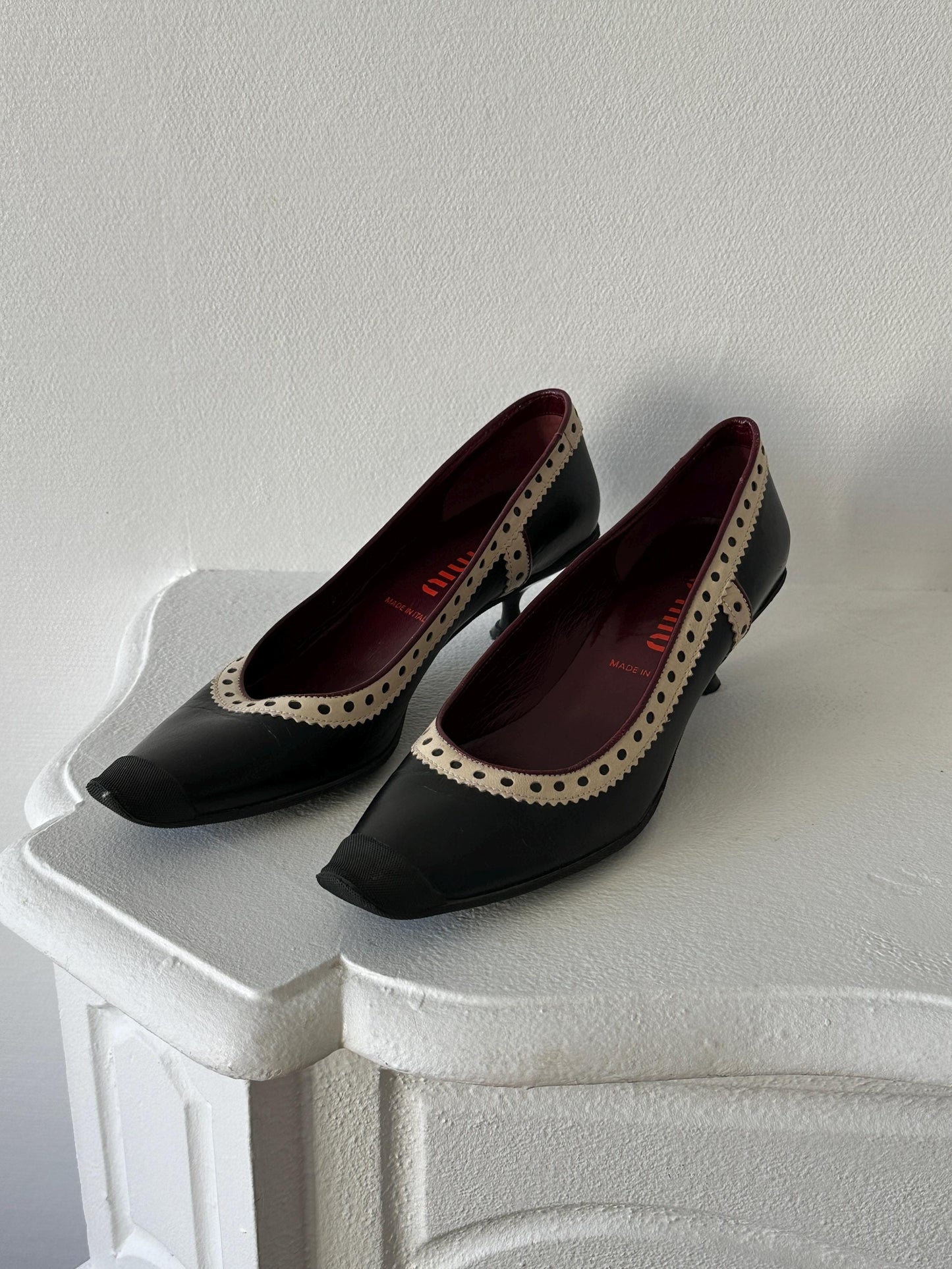 Miu Miu Black & Cream Perforated Leather Kitten Heel Pumps I US 6.5