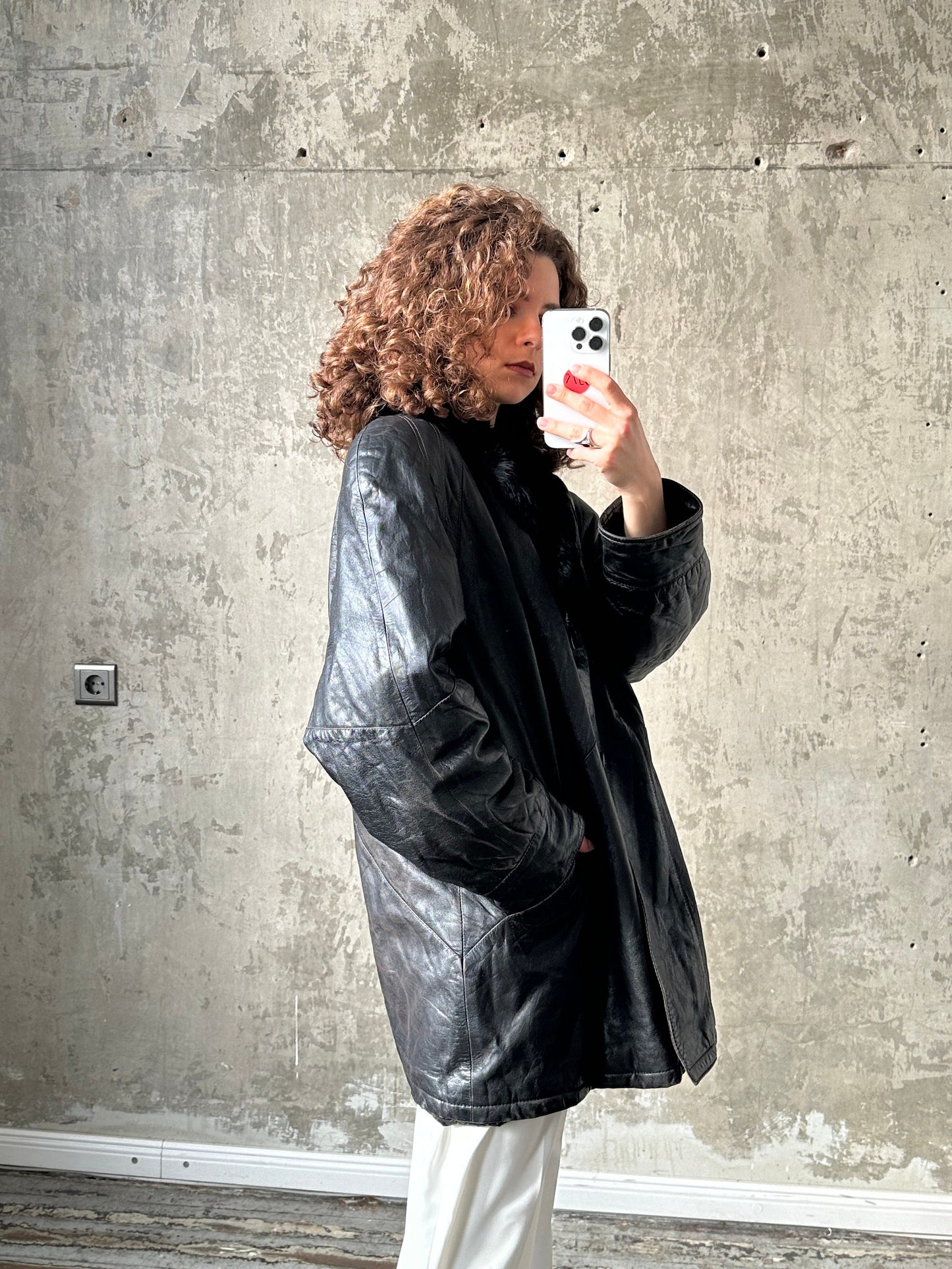 Vintage 90s black leather jacket with fur collar