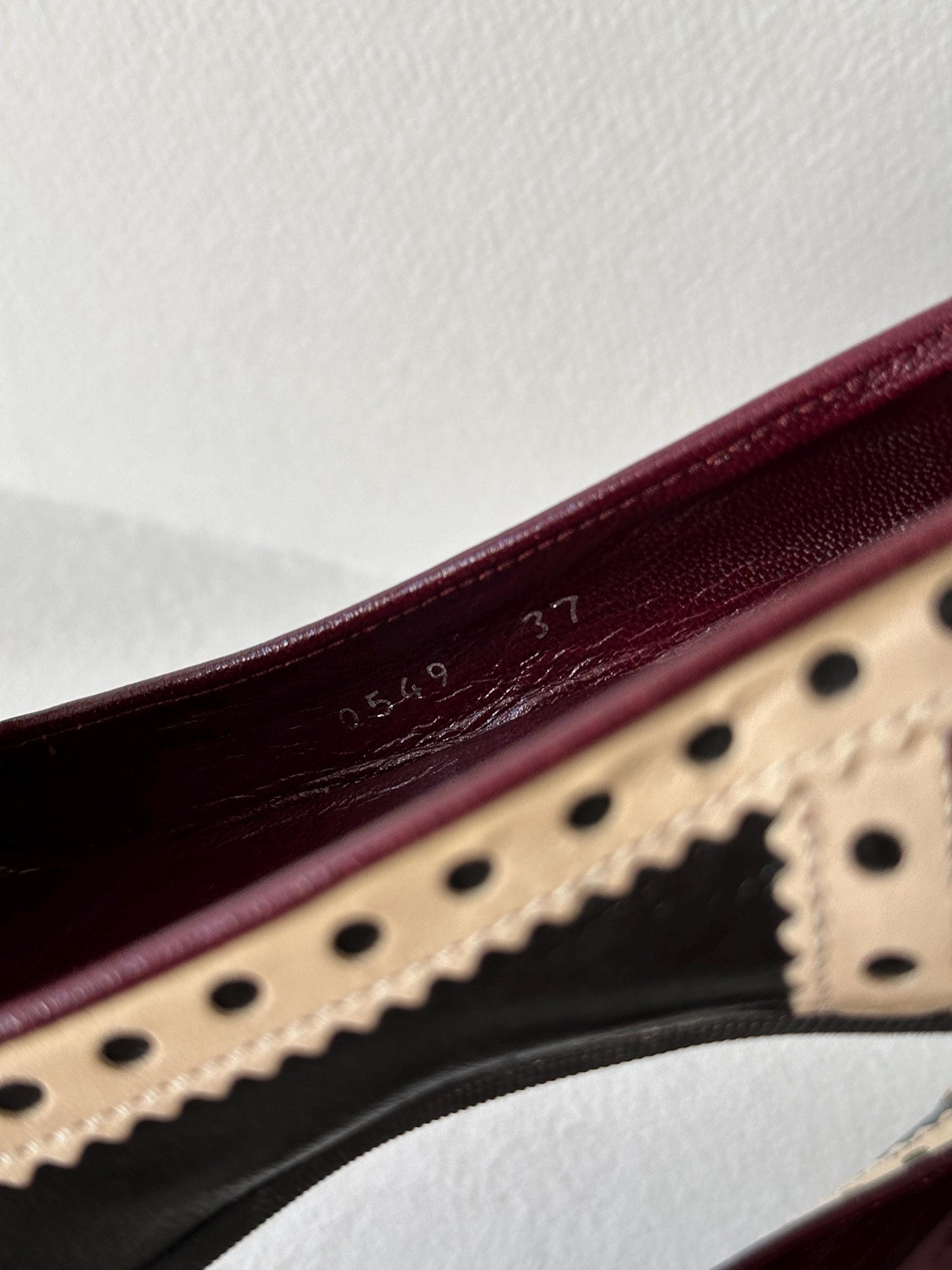 Miu Miu Black & Cream Perforated Leather Kitten Heel Pumps I US 6.5