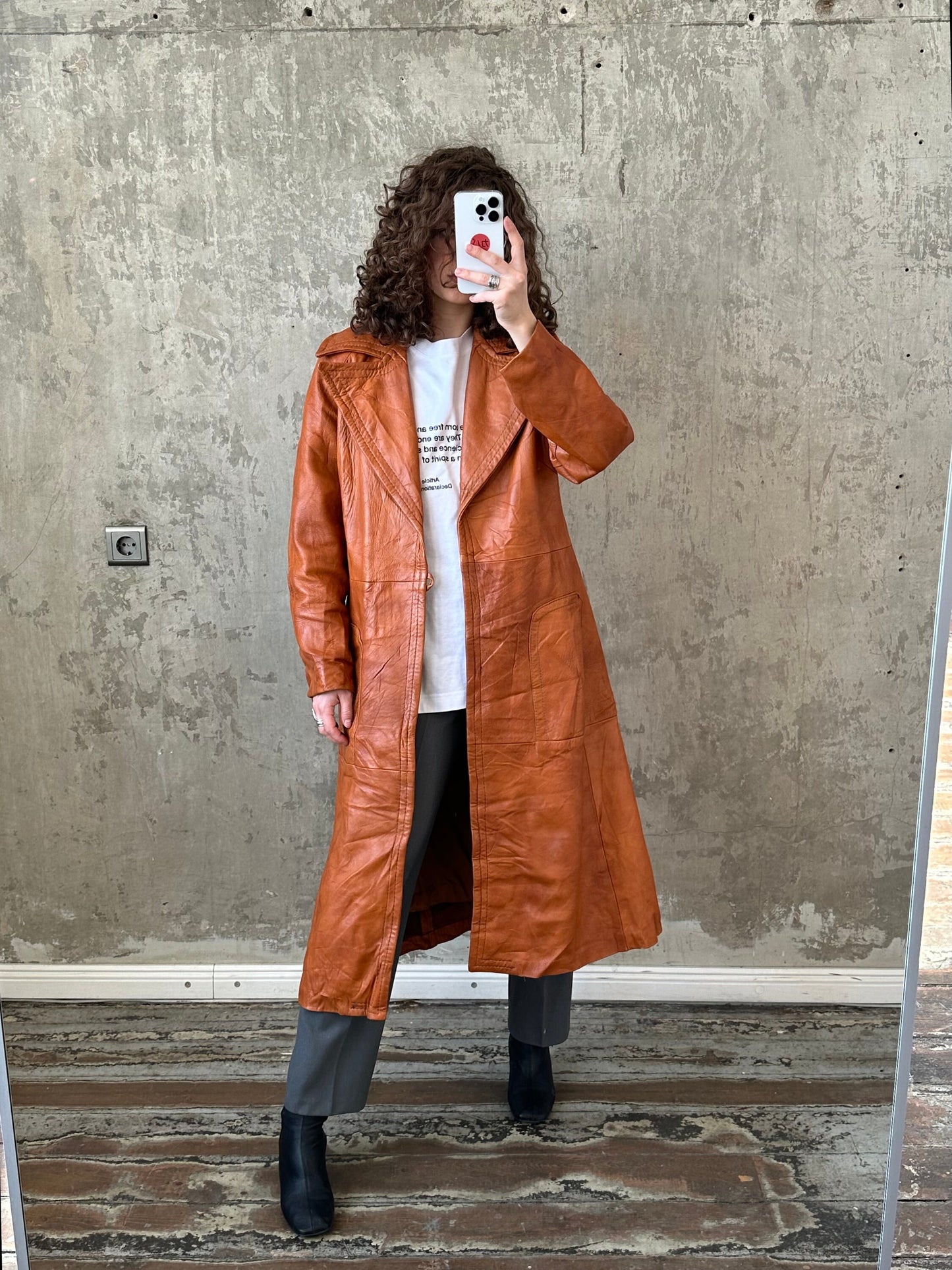 Vintage 90s genuine leather coat in orange