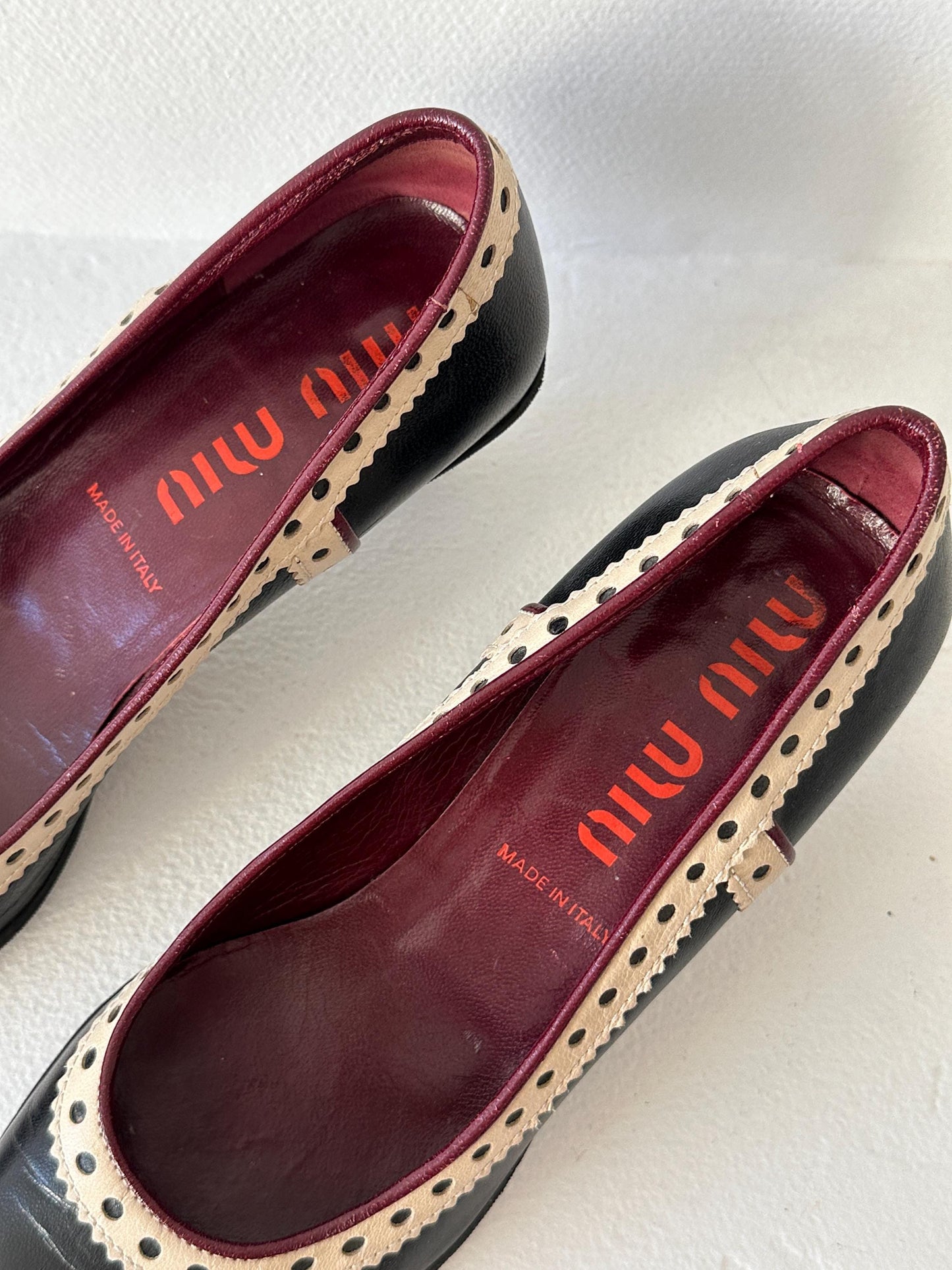 Miu Miu Black & Cream Perforated Leather Kitten Heel Pumps I US 6.5