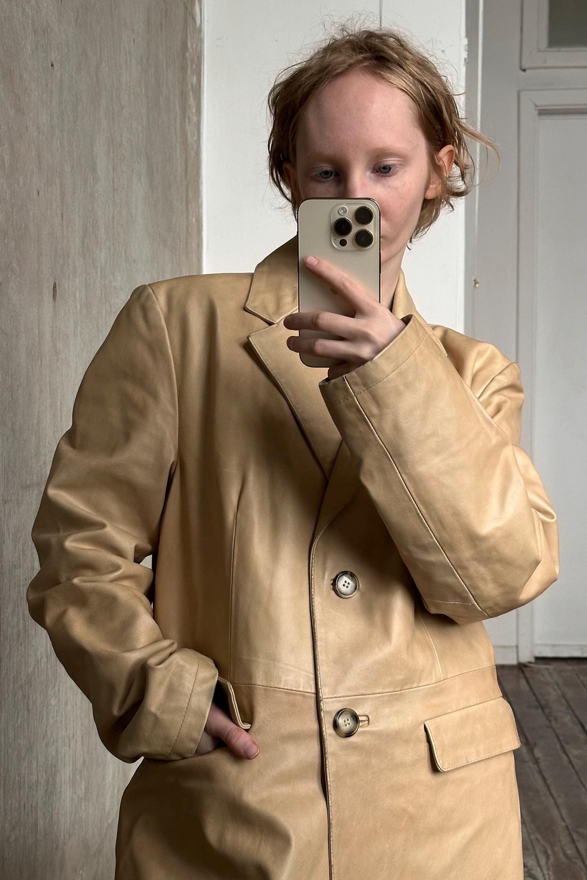a woman taking a selfie with her cell phone