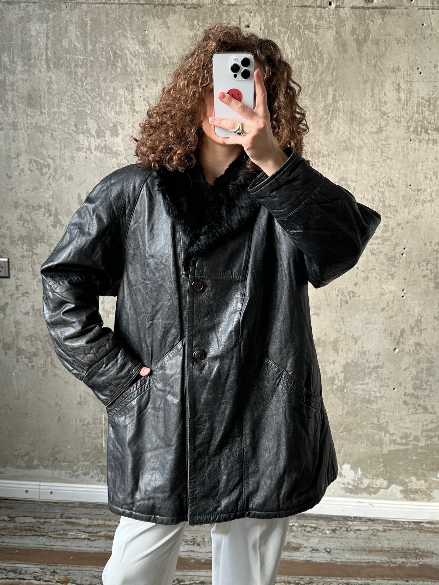 Vintage 90s black leather jacket with fur collar