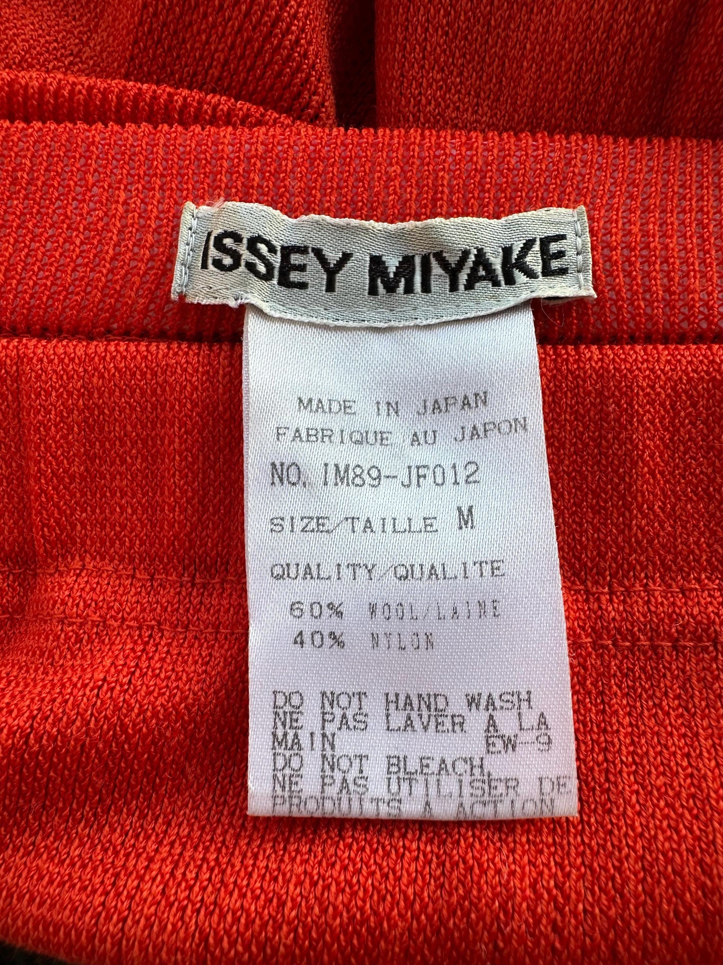 Vintage Issey Miyake flared pleated trousers in bright red