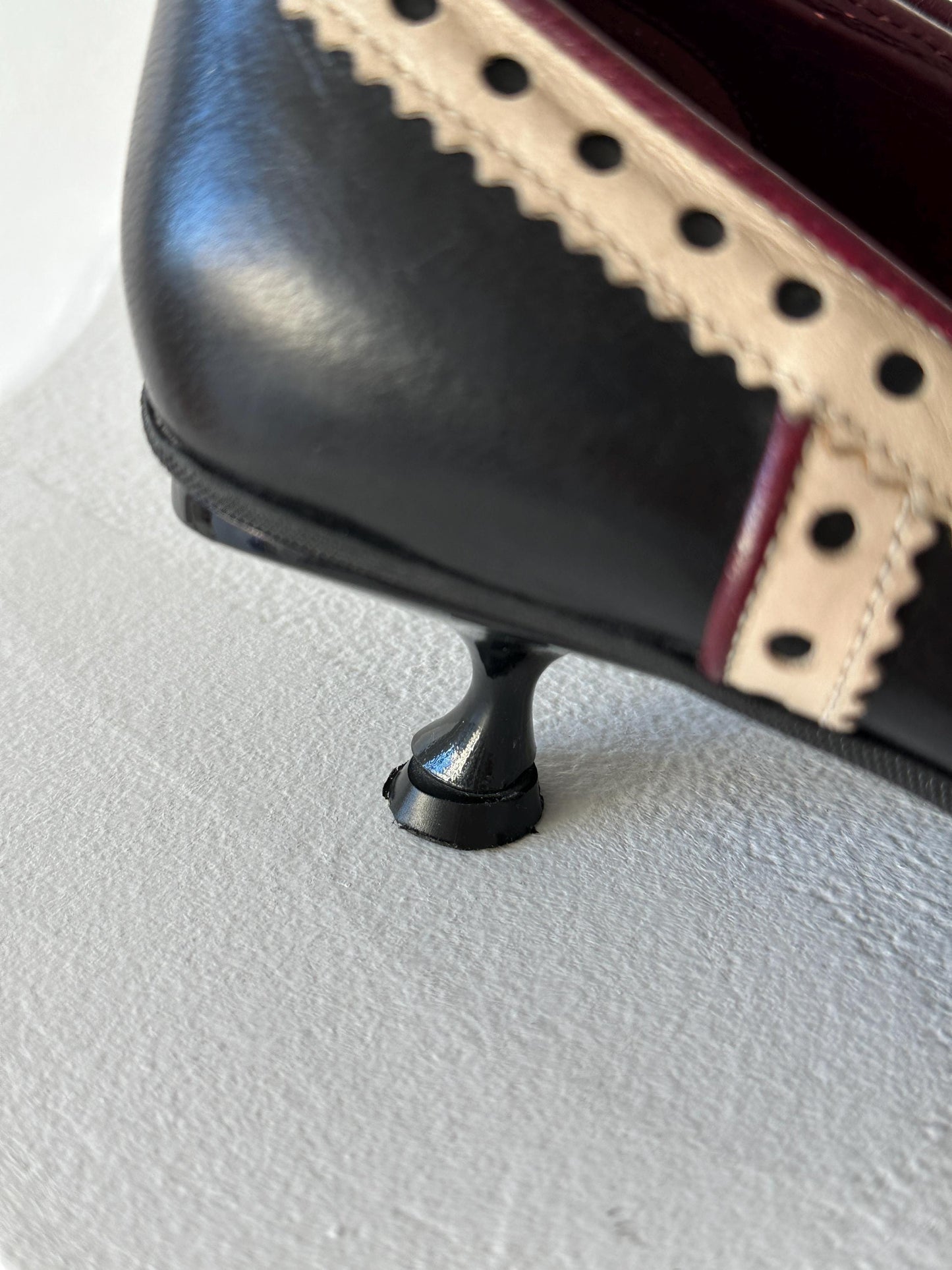 Miu Miu Black & Cream Perforated Leather Kitten Heel Pumps I US 6.5