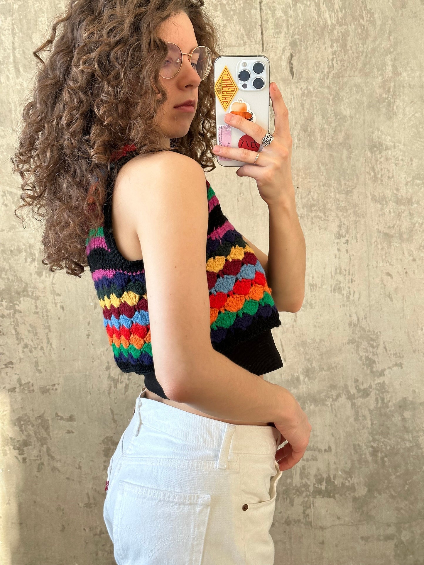 Vintage colorful knitted vest in bright blue, yellow, red