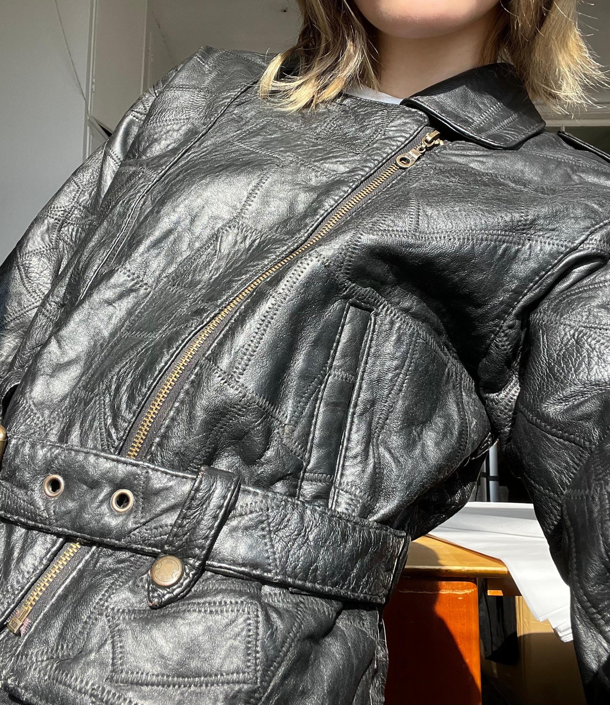 Vintage 80s belted biker leather jacket in black