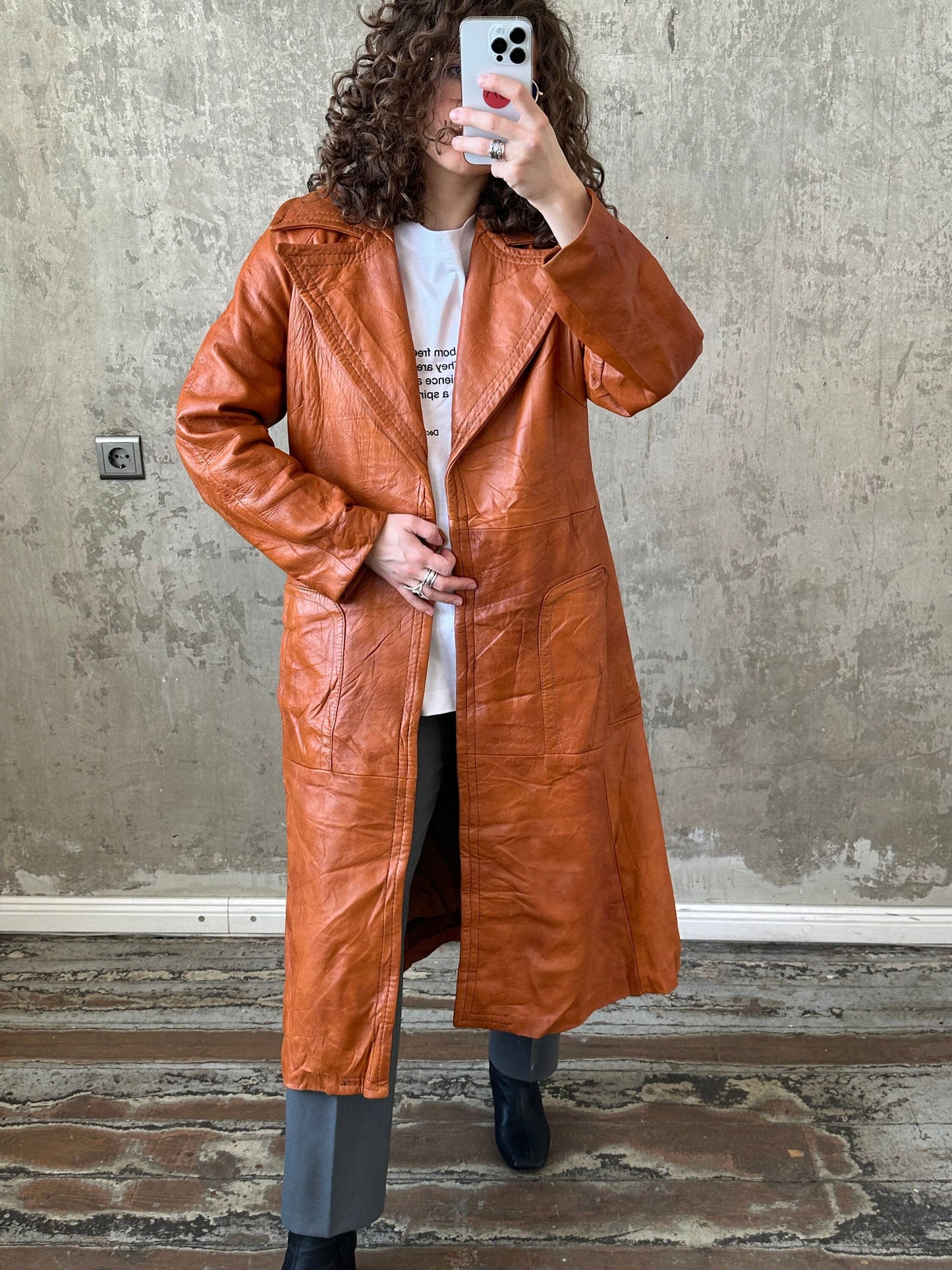 Vintage 90s genuine leather coat in orange