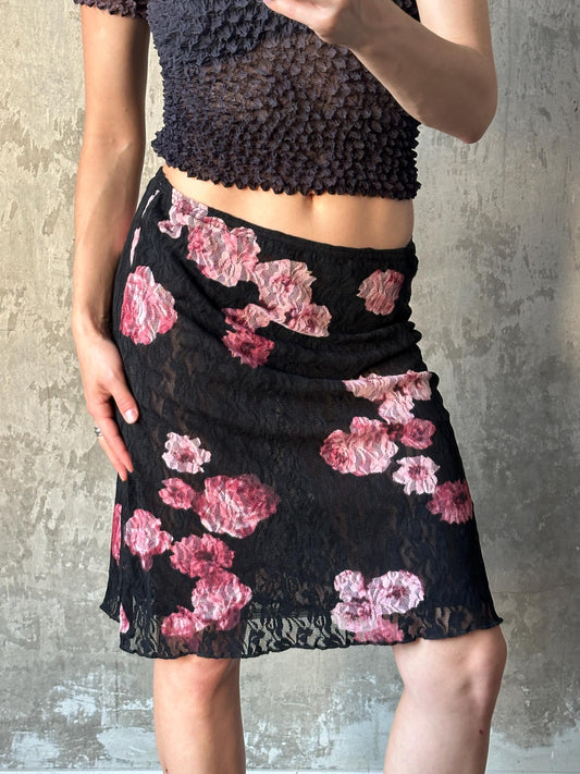 Vintage mini lace skirt with floral motif in black