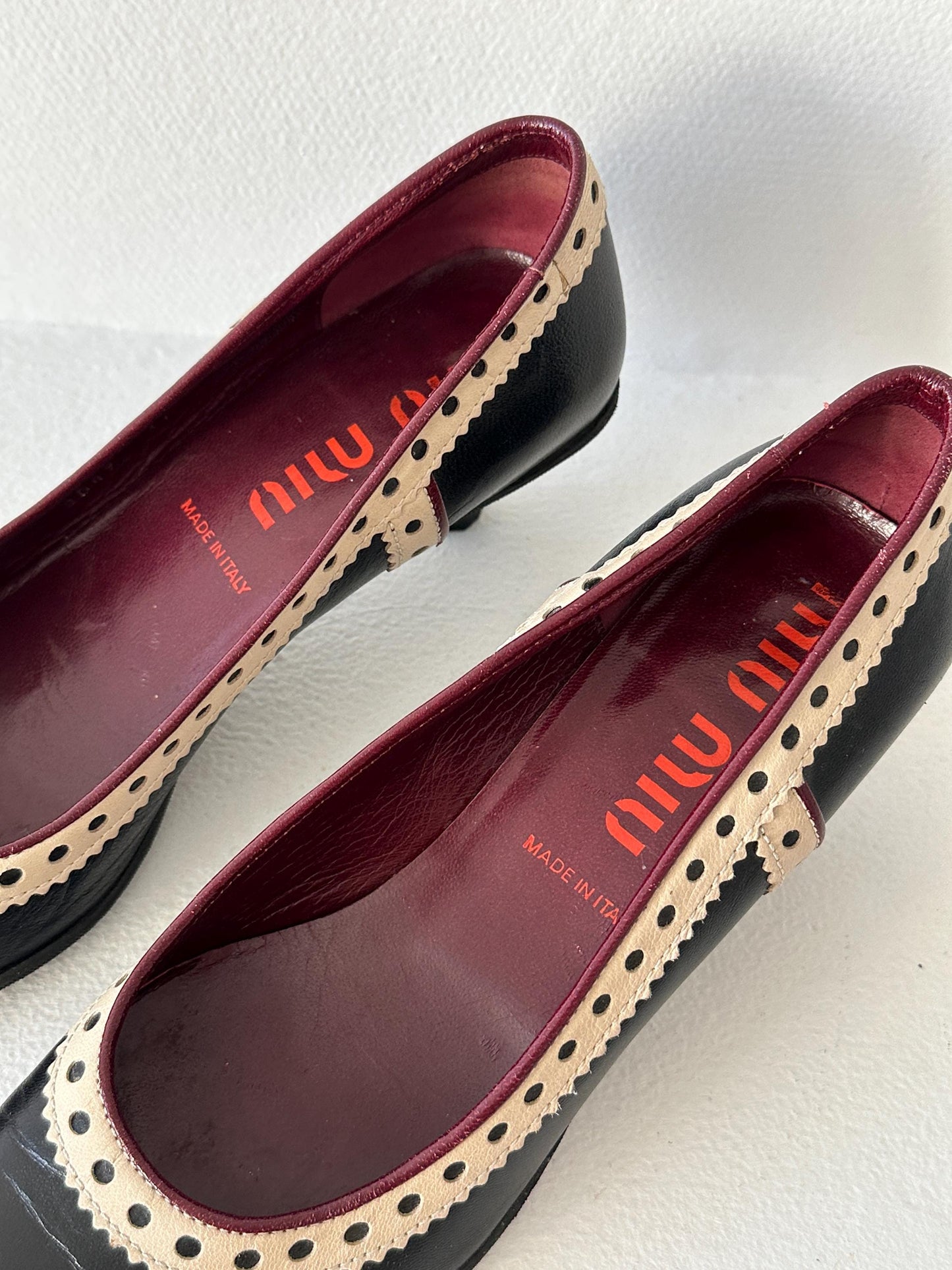 Miu Miu Black & Cream Perforated Leather Kitten Heel Pumps I US 6.5