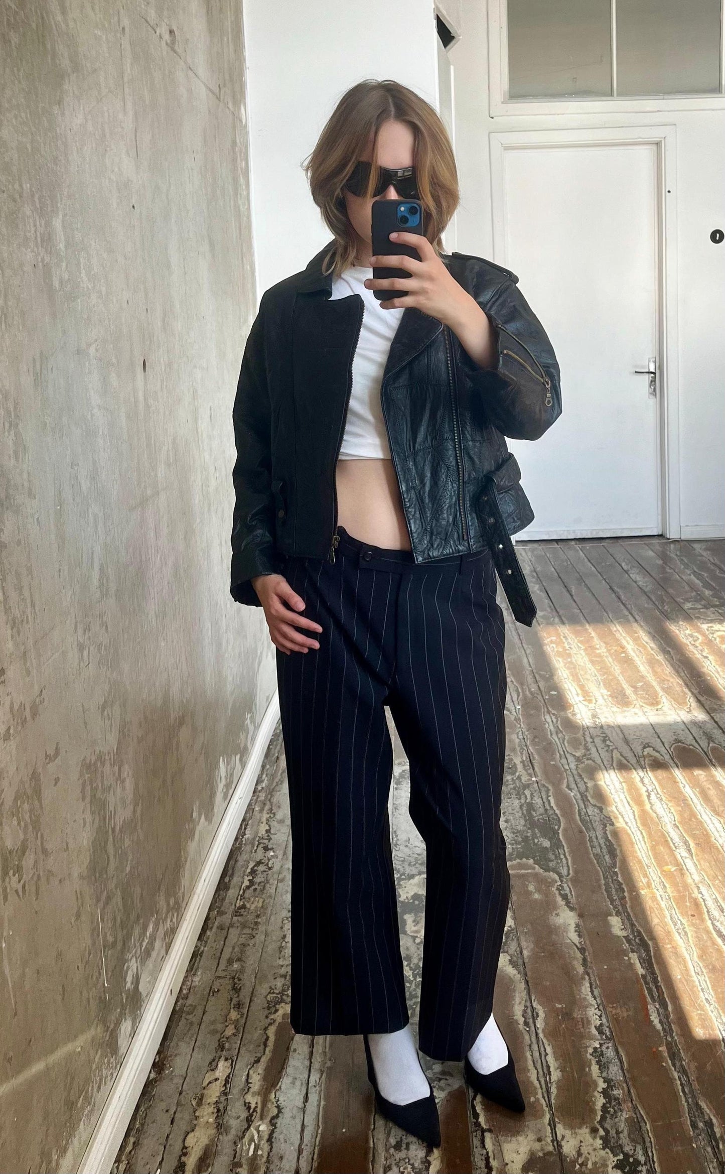 Vintage 80s belted biker leather jacket in black