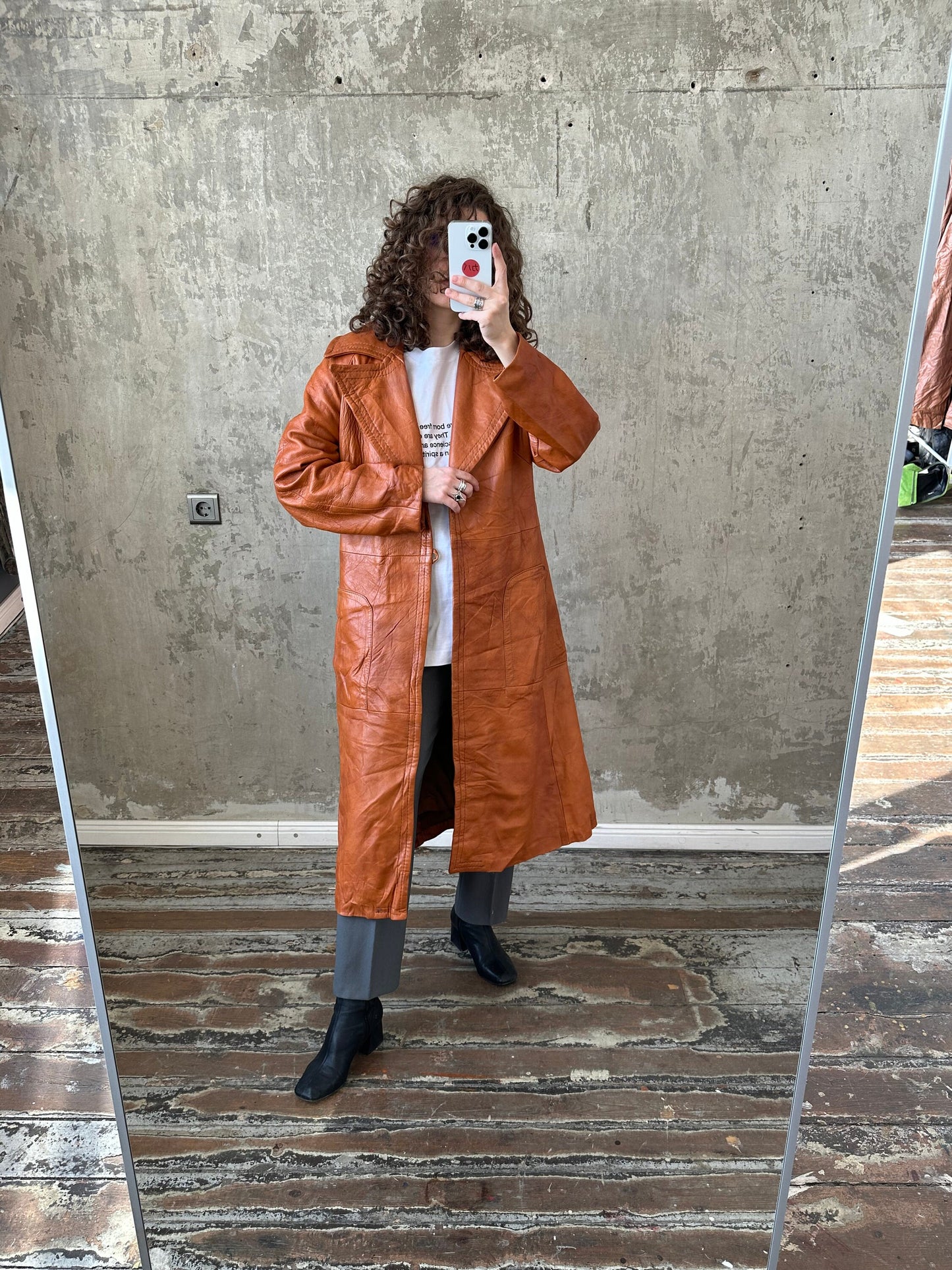 Vintage 90s genuine leather coat in orange