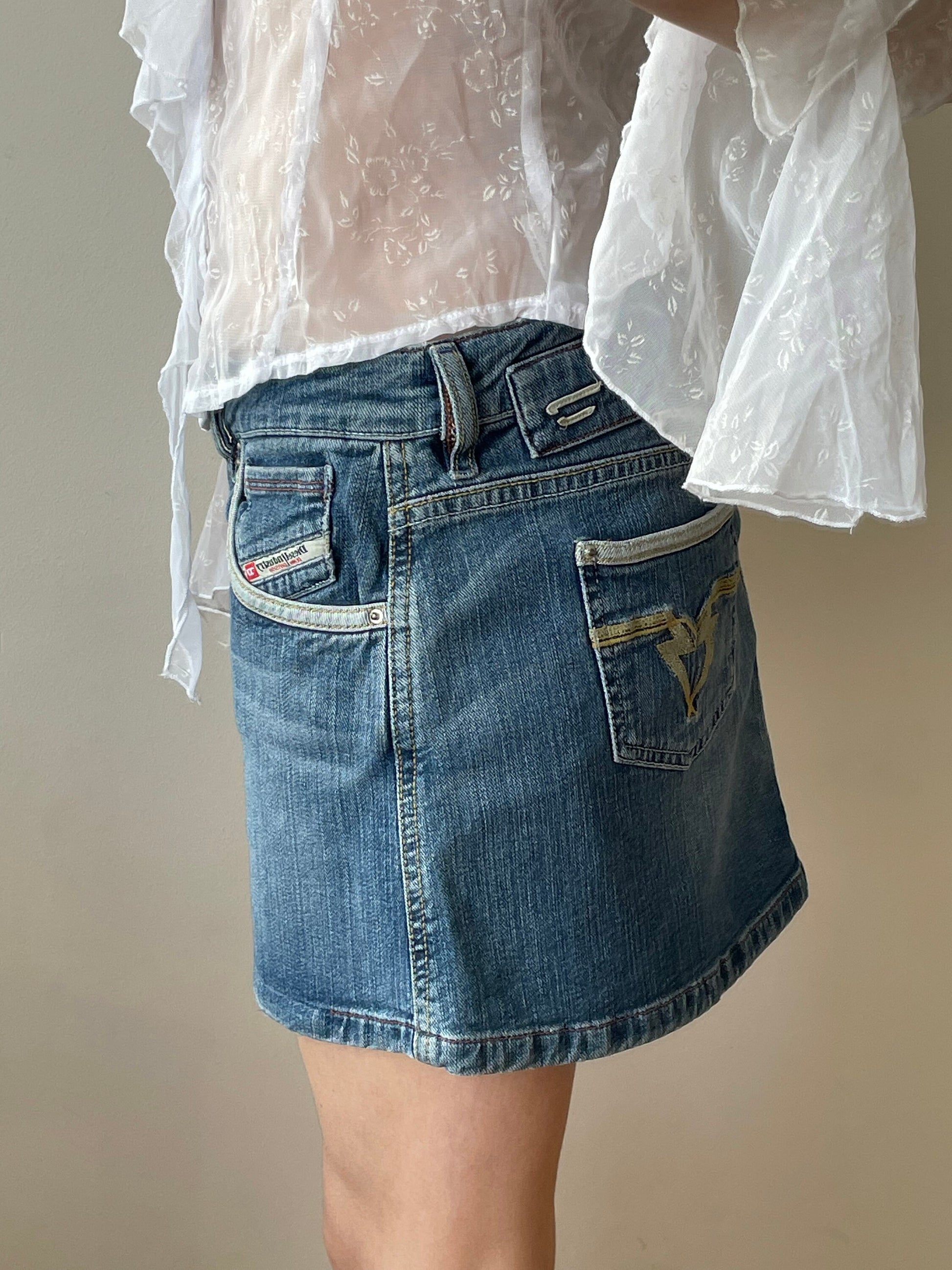 Vintage y2k DIESEL denim mini skirt in blue