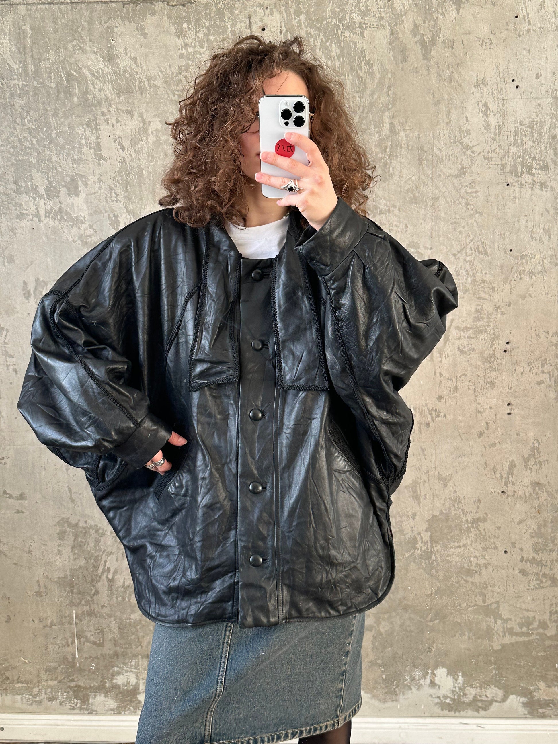 Vintage 90s leather bomber jacket in black with batwing sleeves