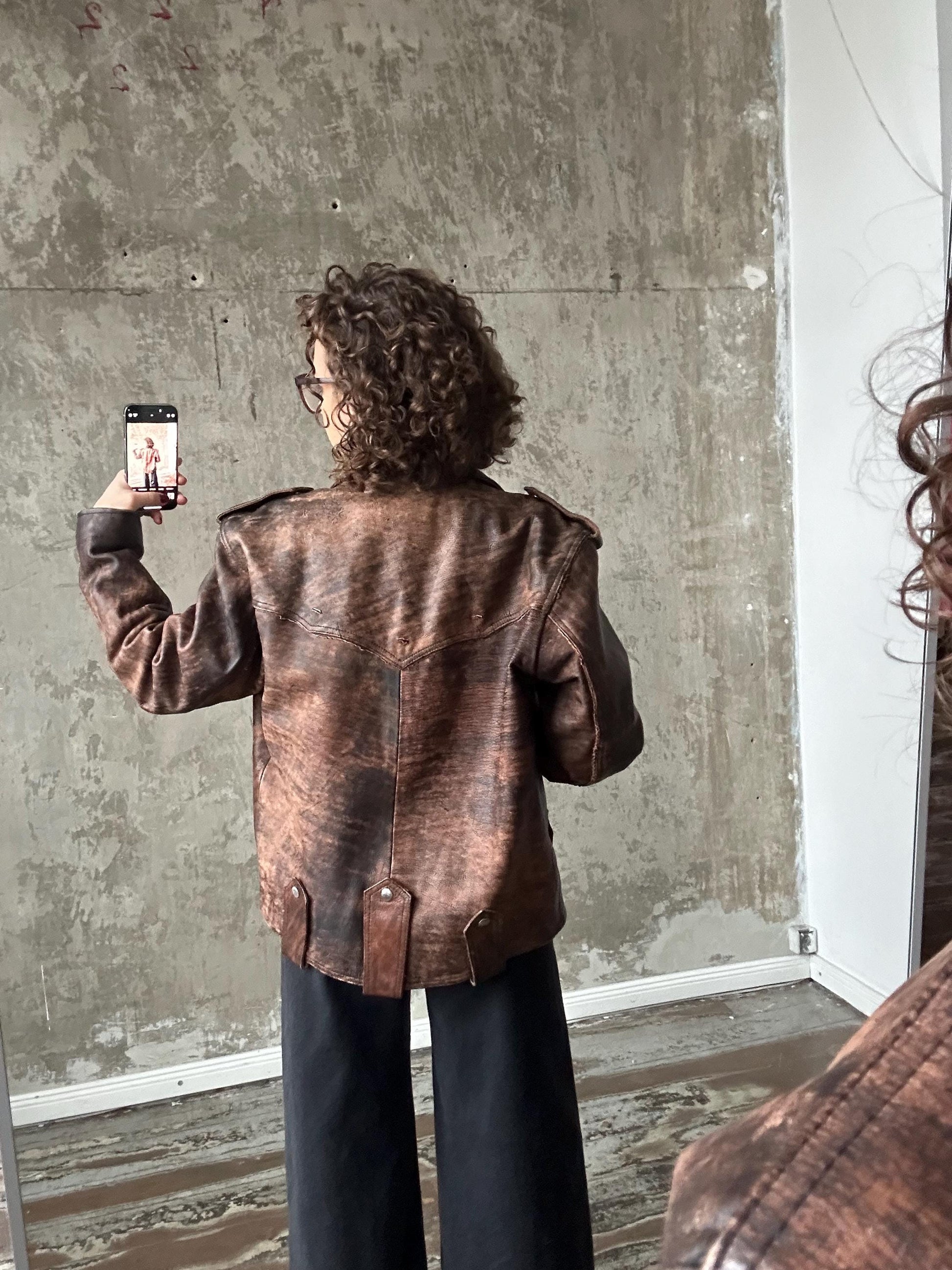 Vintage distressed leather motorcycle bomber jacket in brown