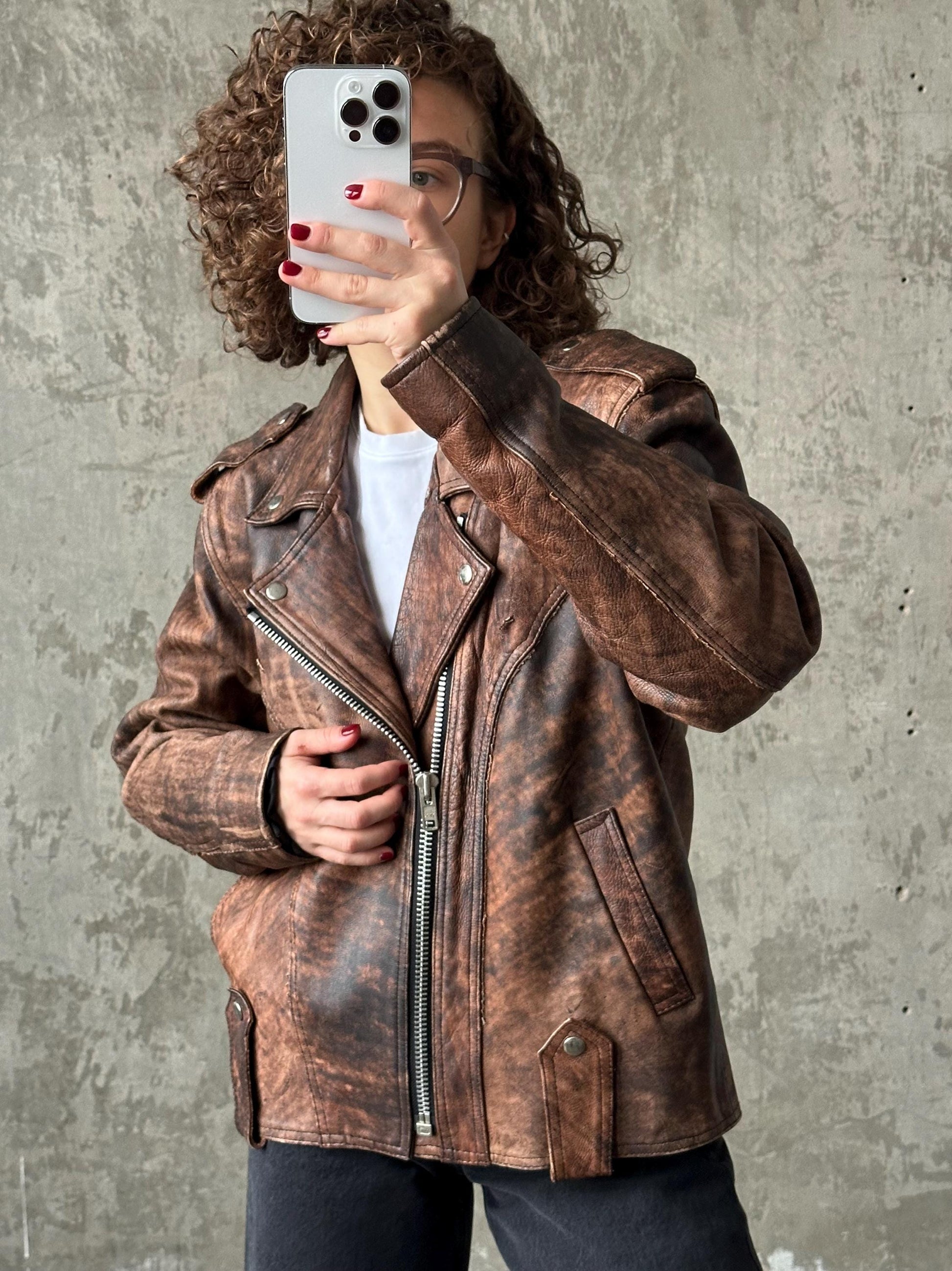 Vintage distressed leather motorcycle bomber jacket in brown