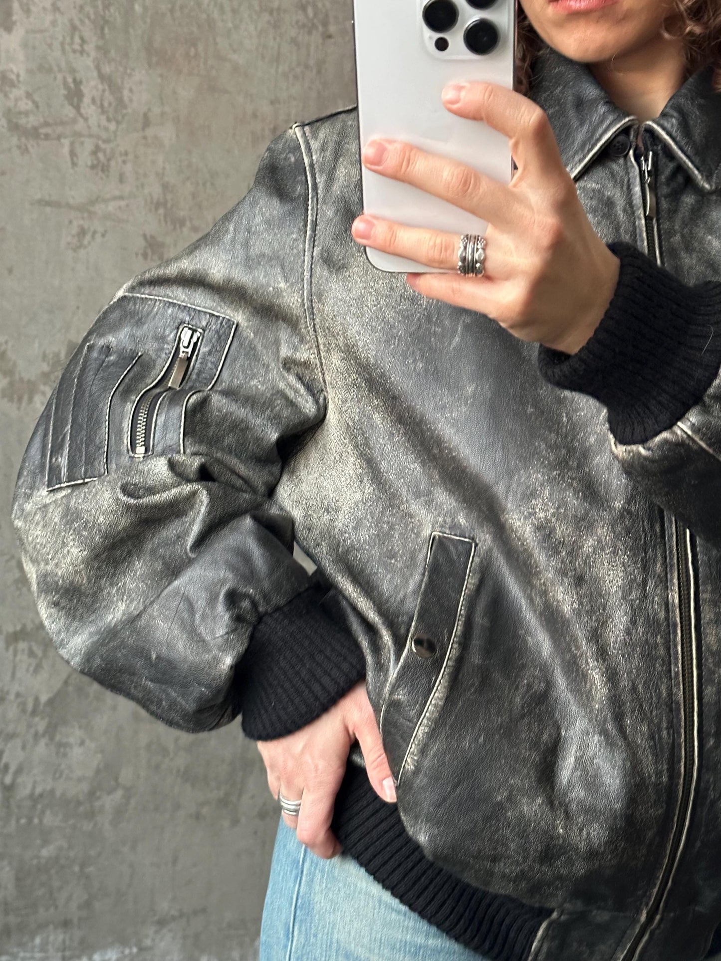 Vintage distressed leather bomber jacket in black with shades