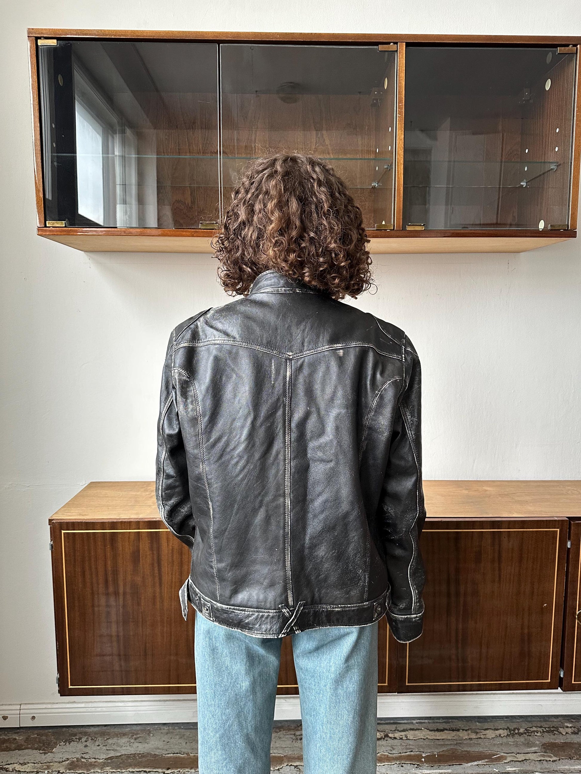 Vintage distressed leather bomber jacket in black with shades